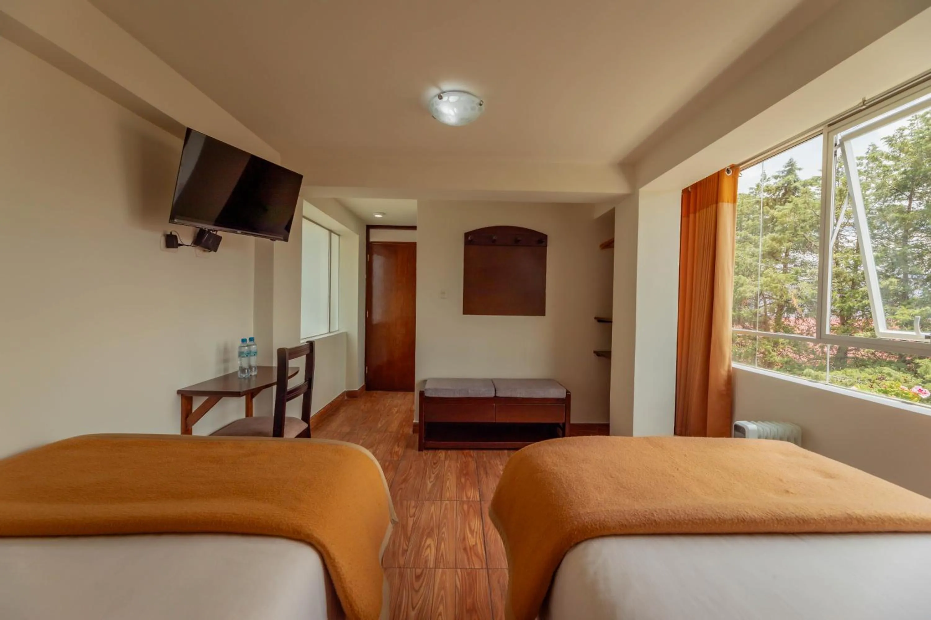 Communal lounge/ TV room, Bed in Dreams Boutique Hotel Cusco