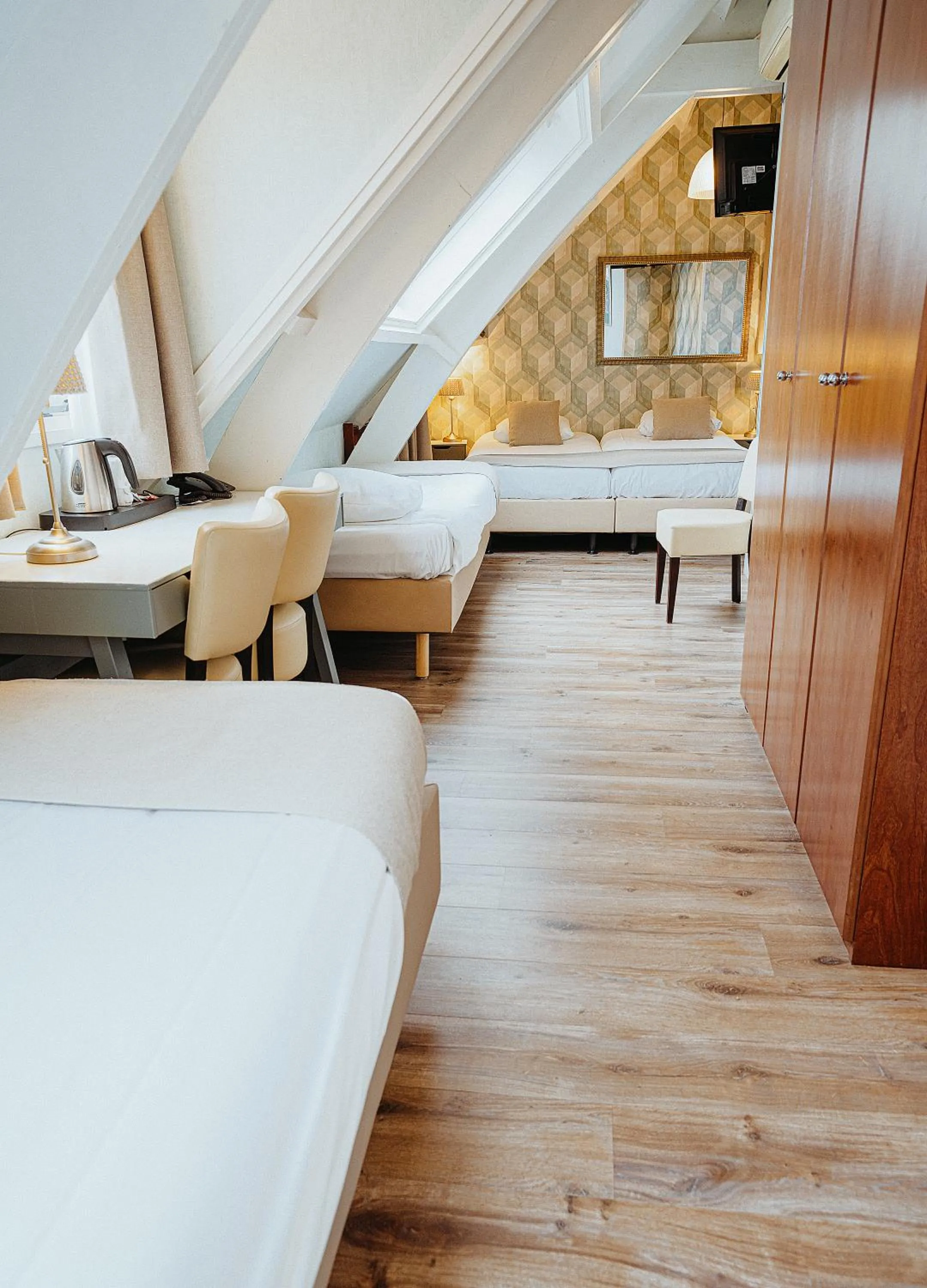 Bed in Hotel Johannes Vermeer Delft