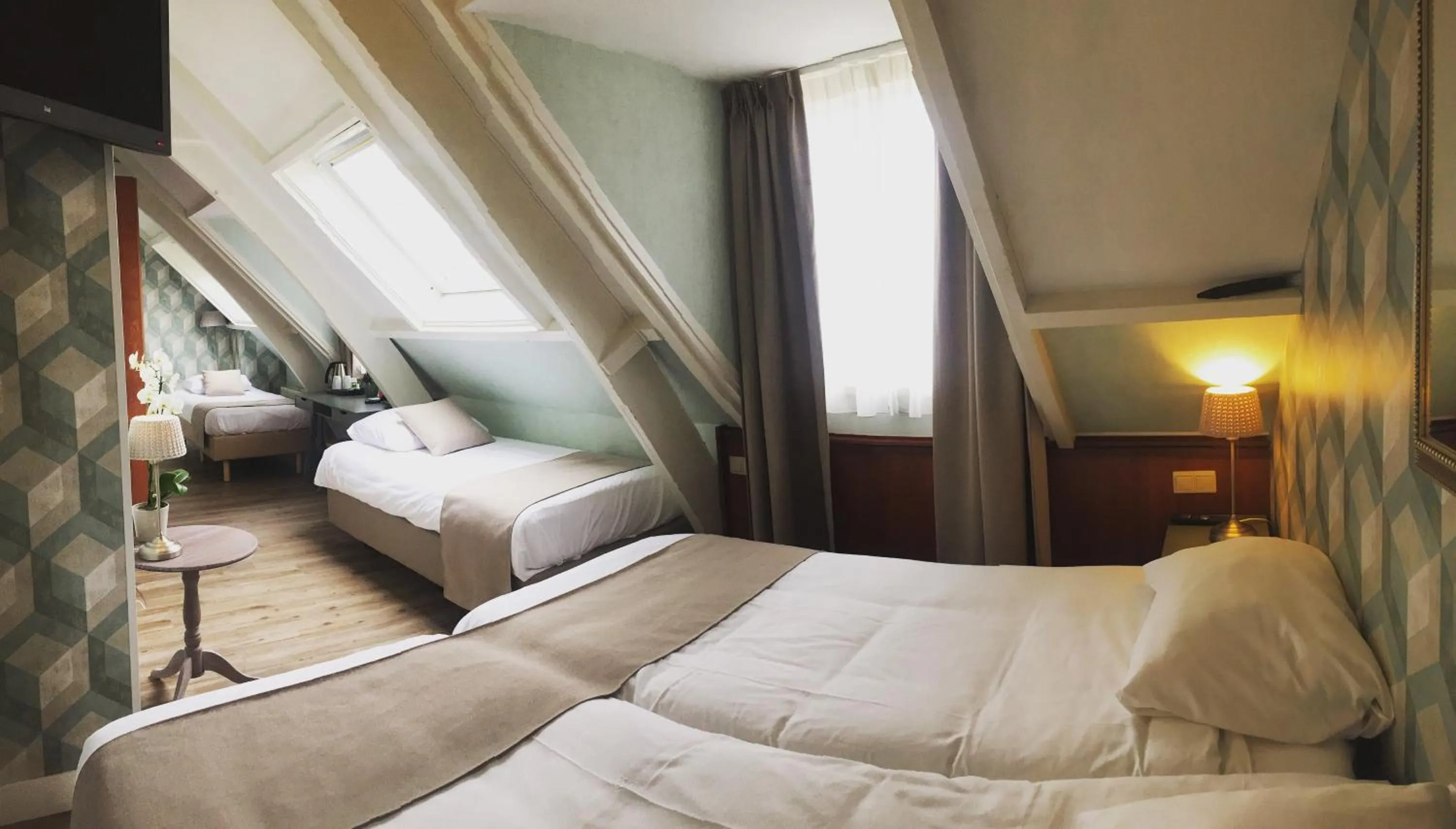 Bed in Hotel Johannes Vermeer Delft