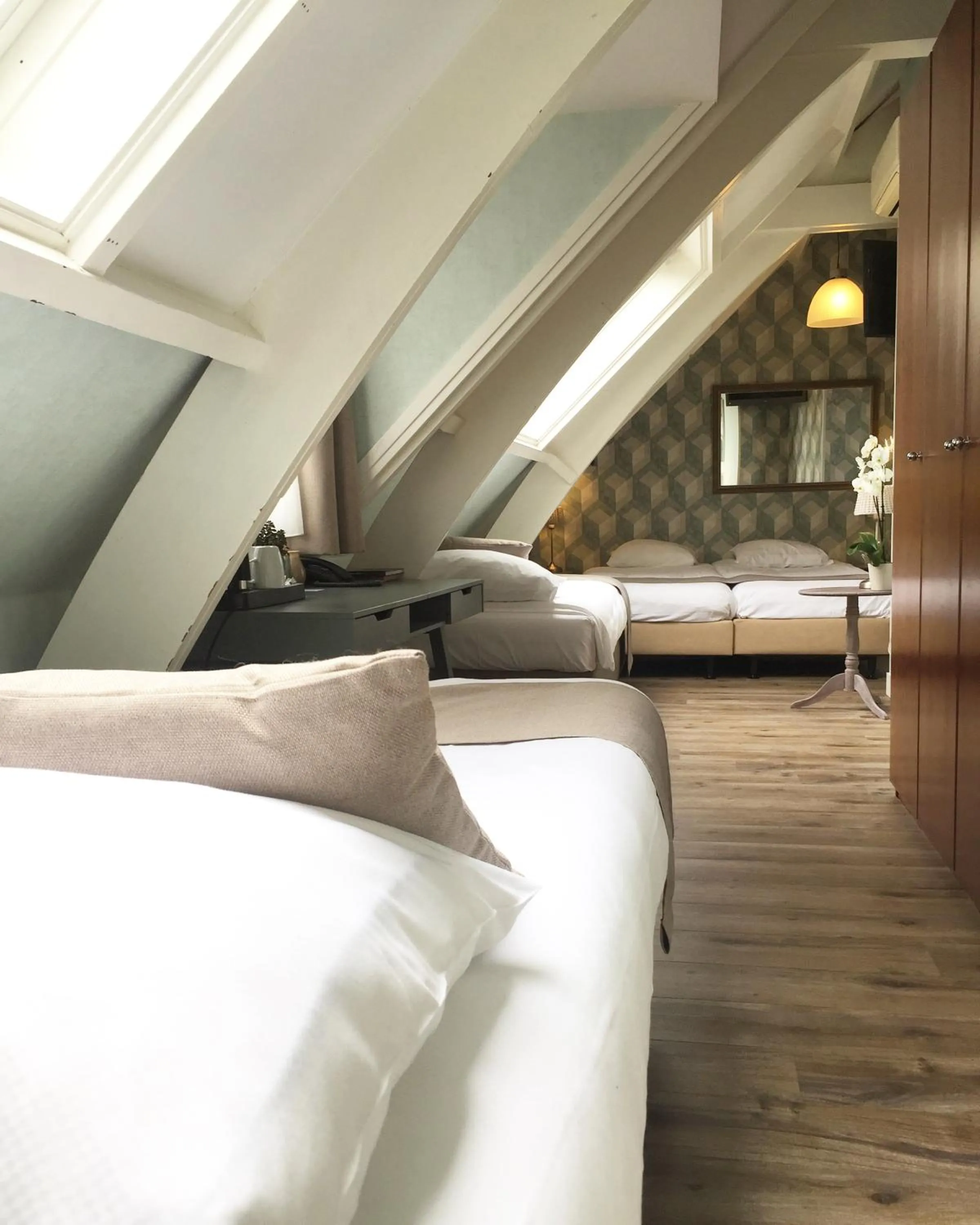 Bed in Hotel Johannes Vermeer Delft