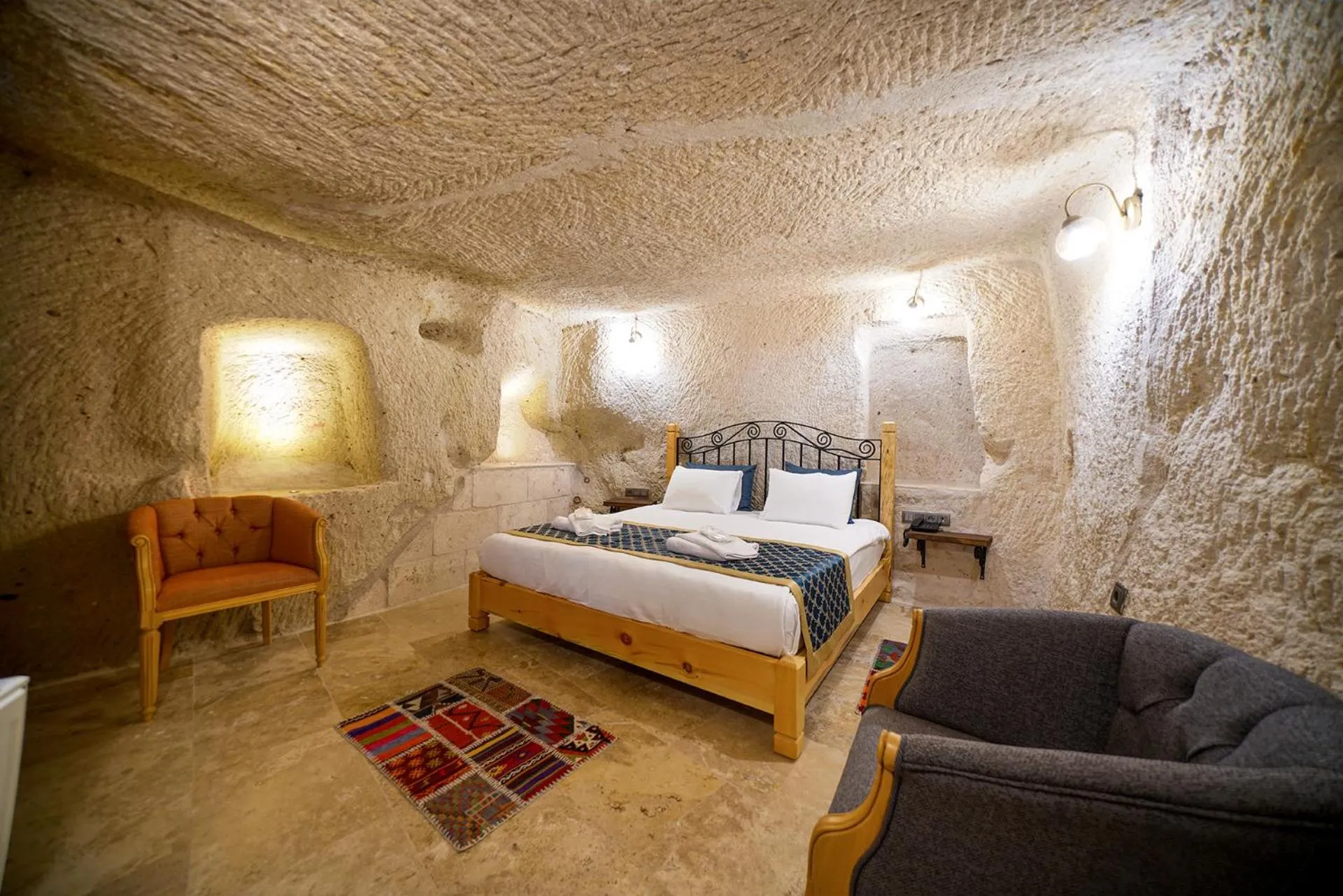 Bed in Caverna Hotel Premium Caves
