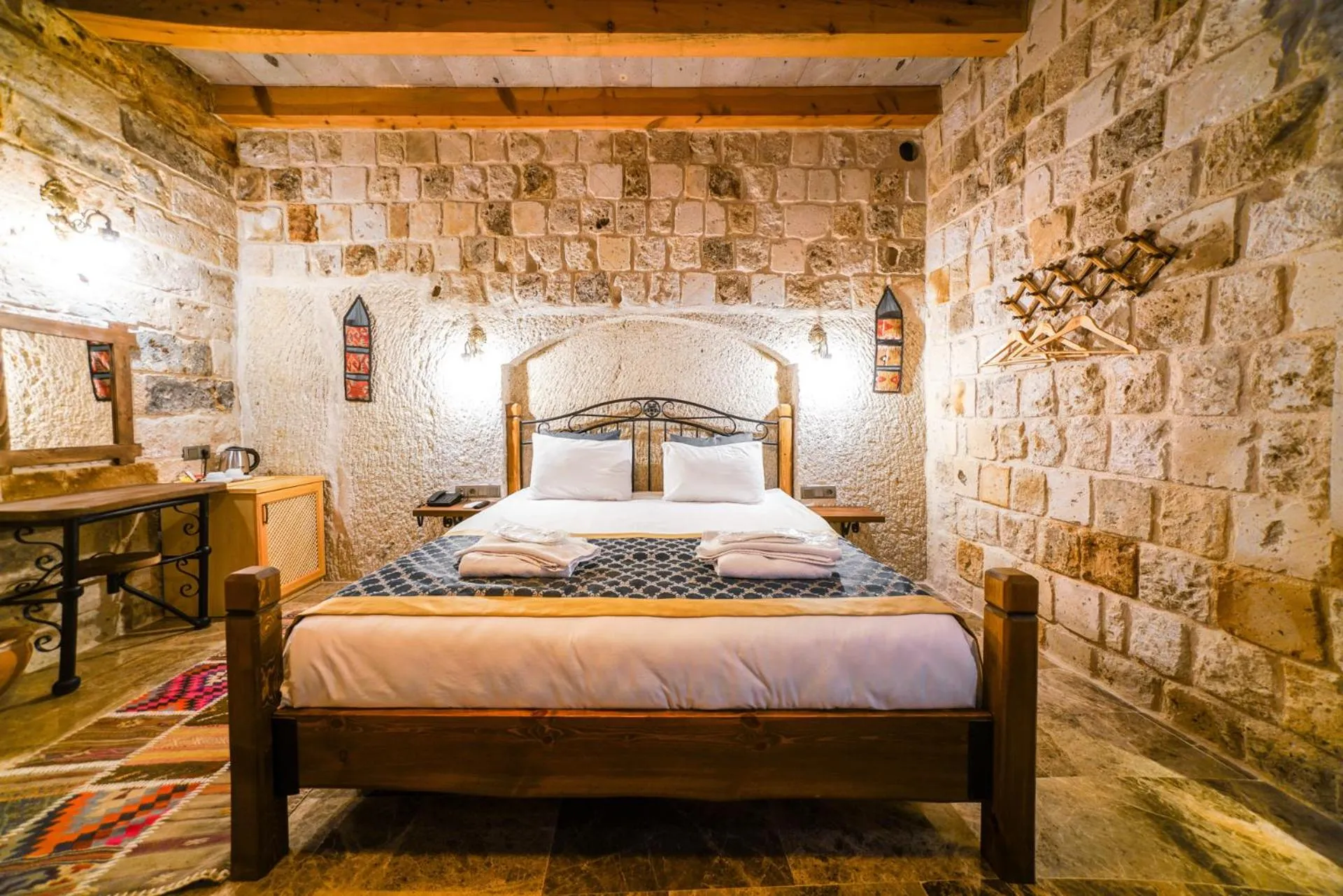 Bed in Caverna Hotel Premium Caves