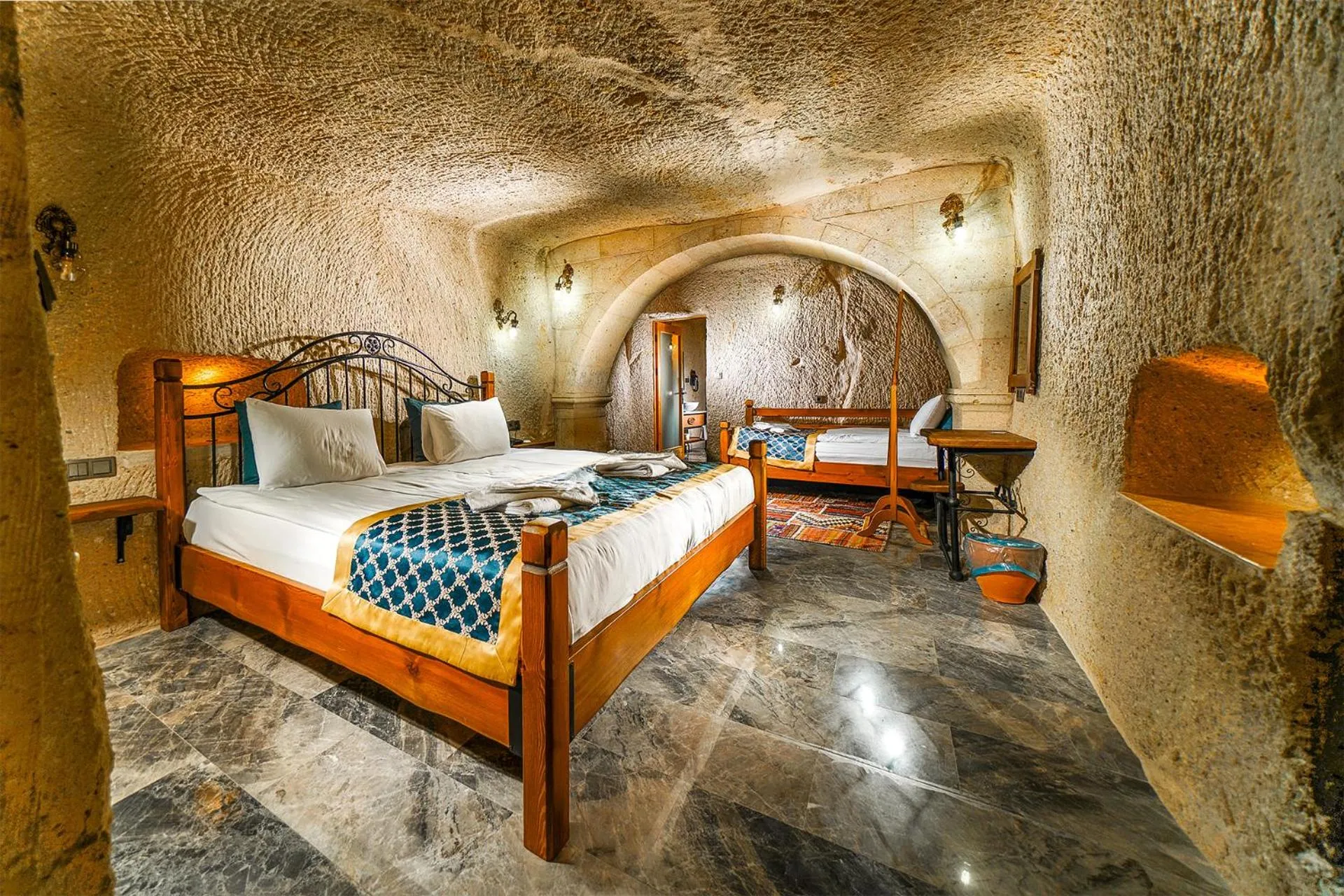 Bed in Caverna Hotel Premium Caves