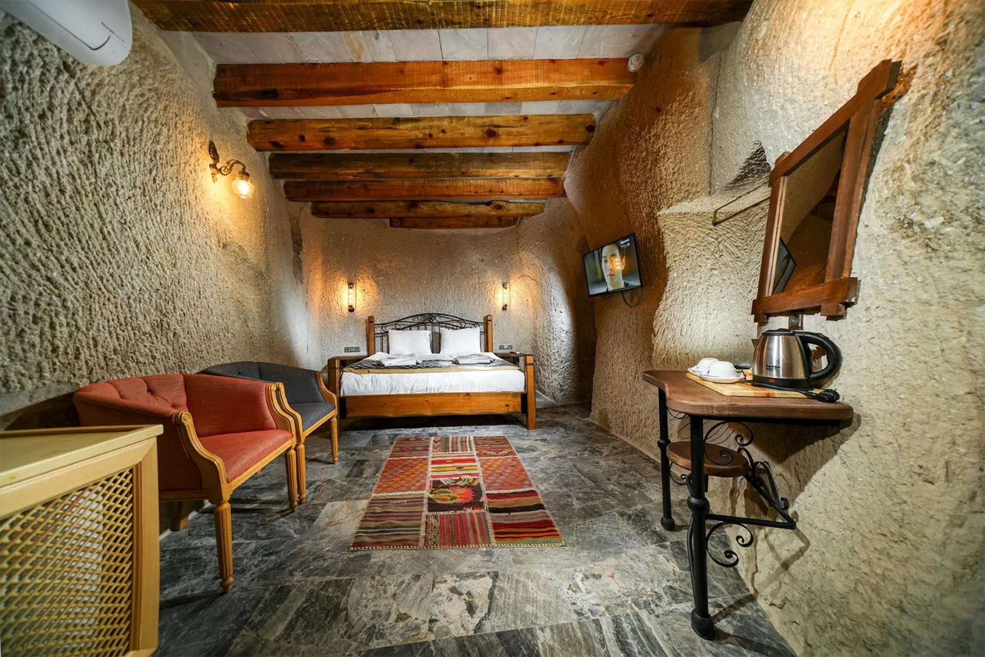 Bed in Caverna Hotel Premium Caves