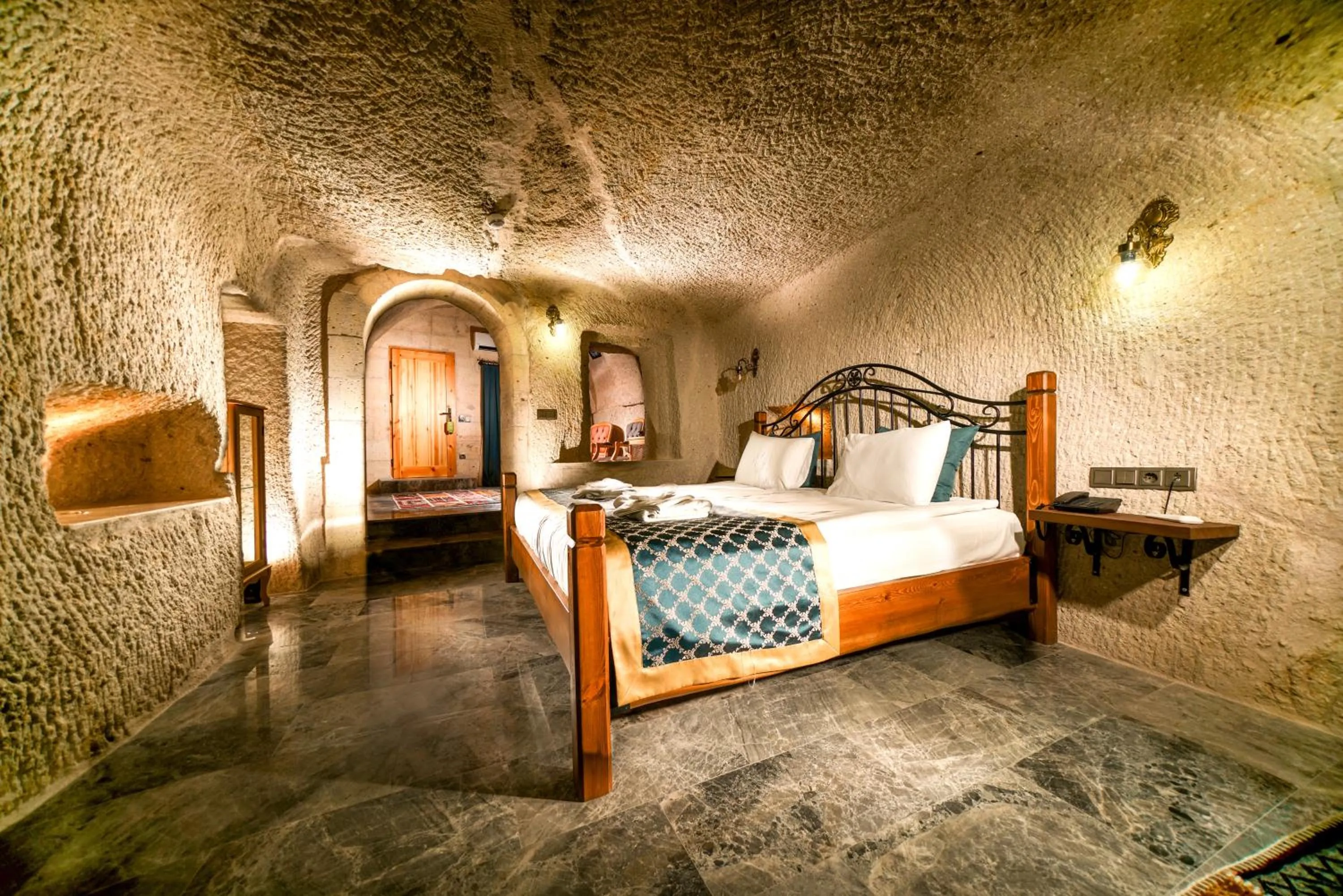 Bed in Caverna Hotel Premium Caves