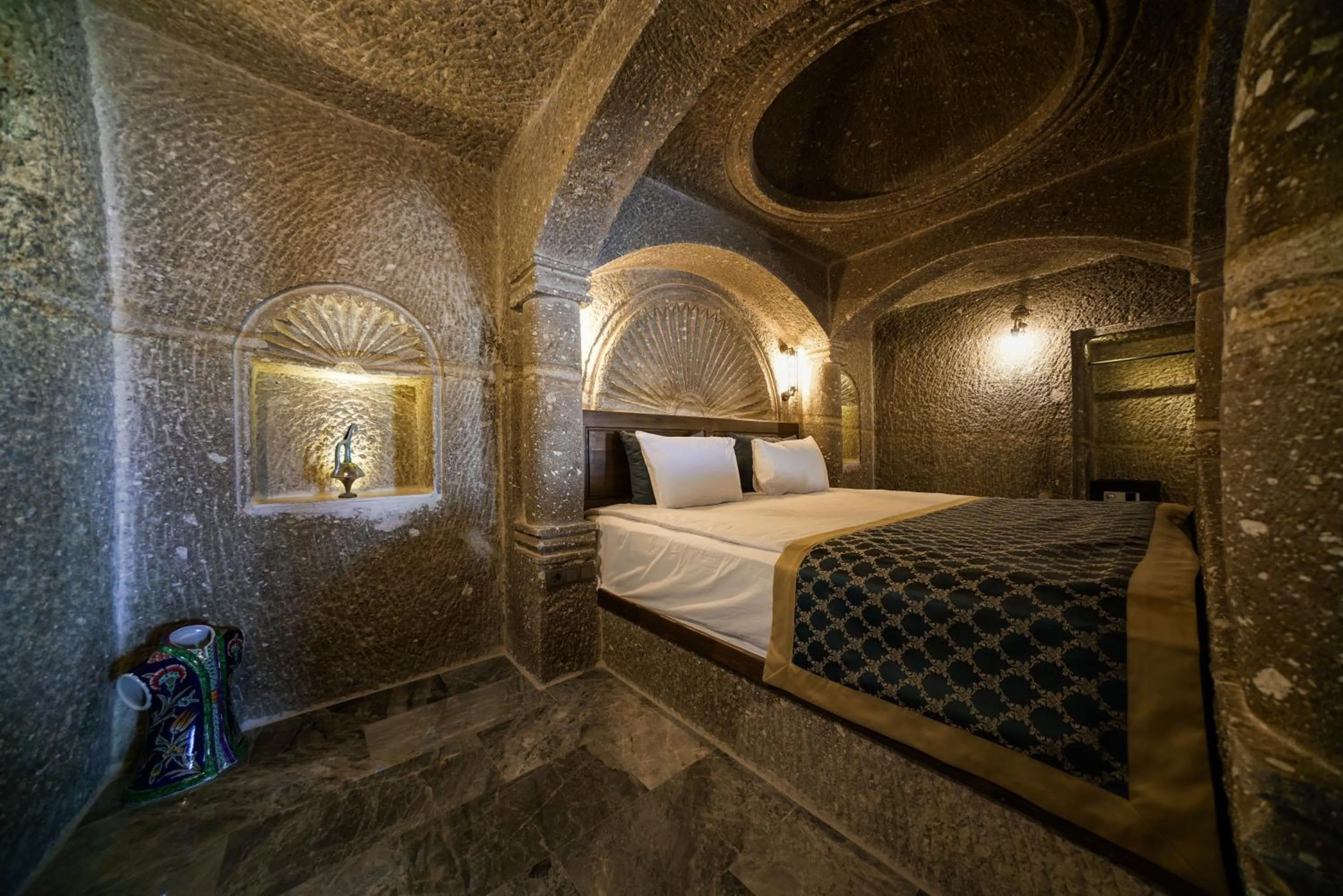 Bed in Caverna Hotel Premium Caves