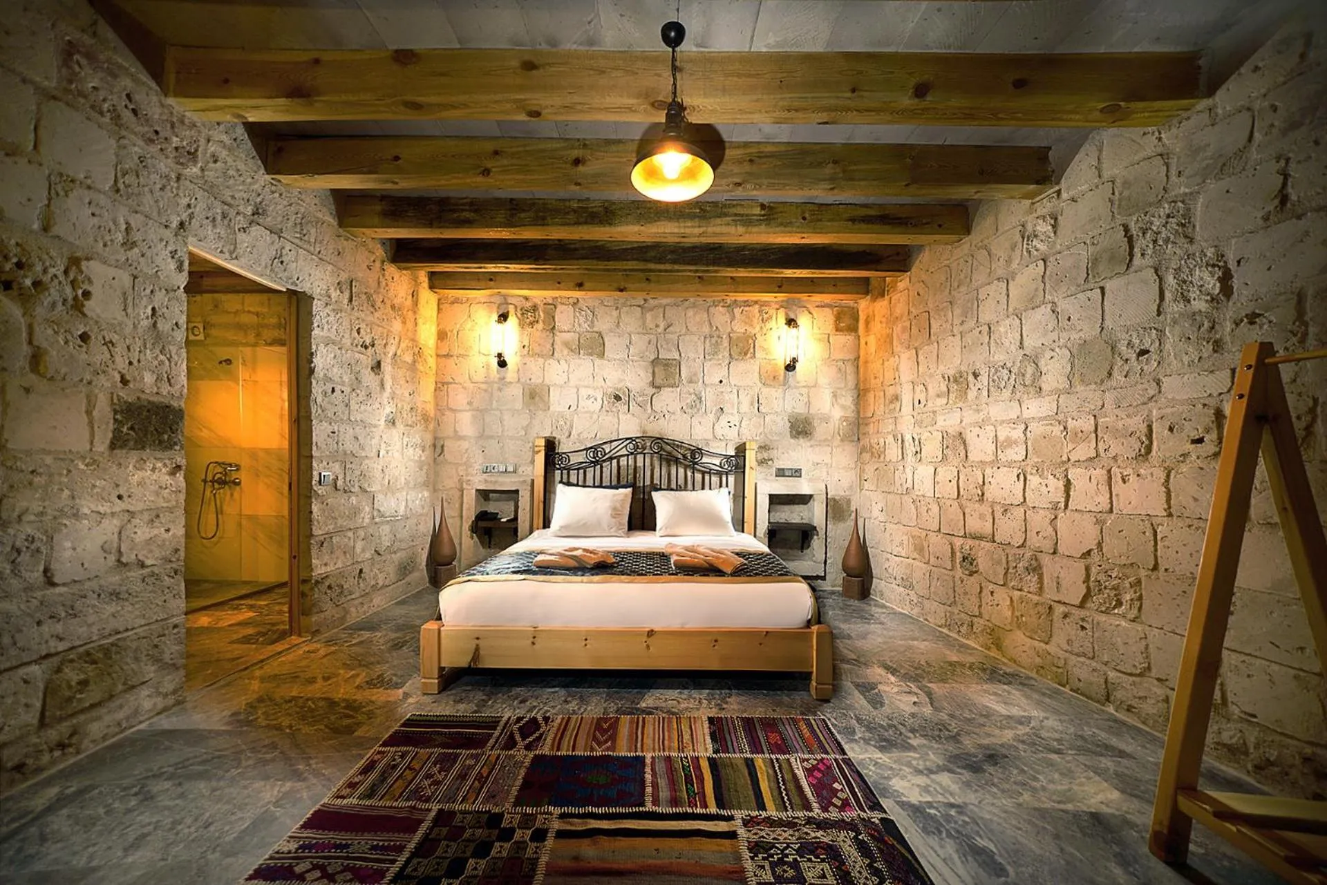 Bed in Caverna Hotel Premium Caves