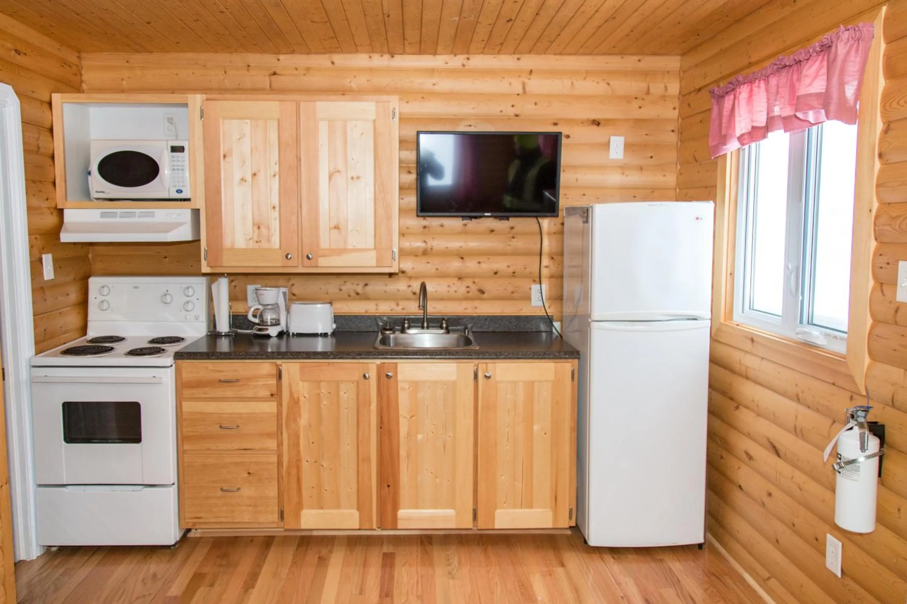 Kitchen or kitchenette in Burnt Cape Cabins