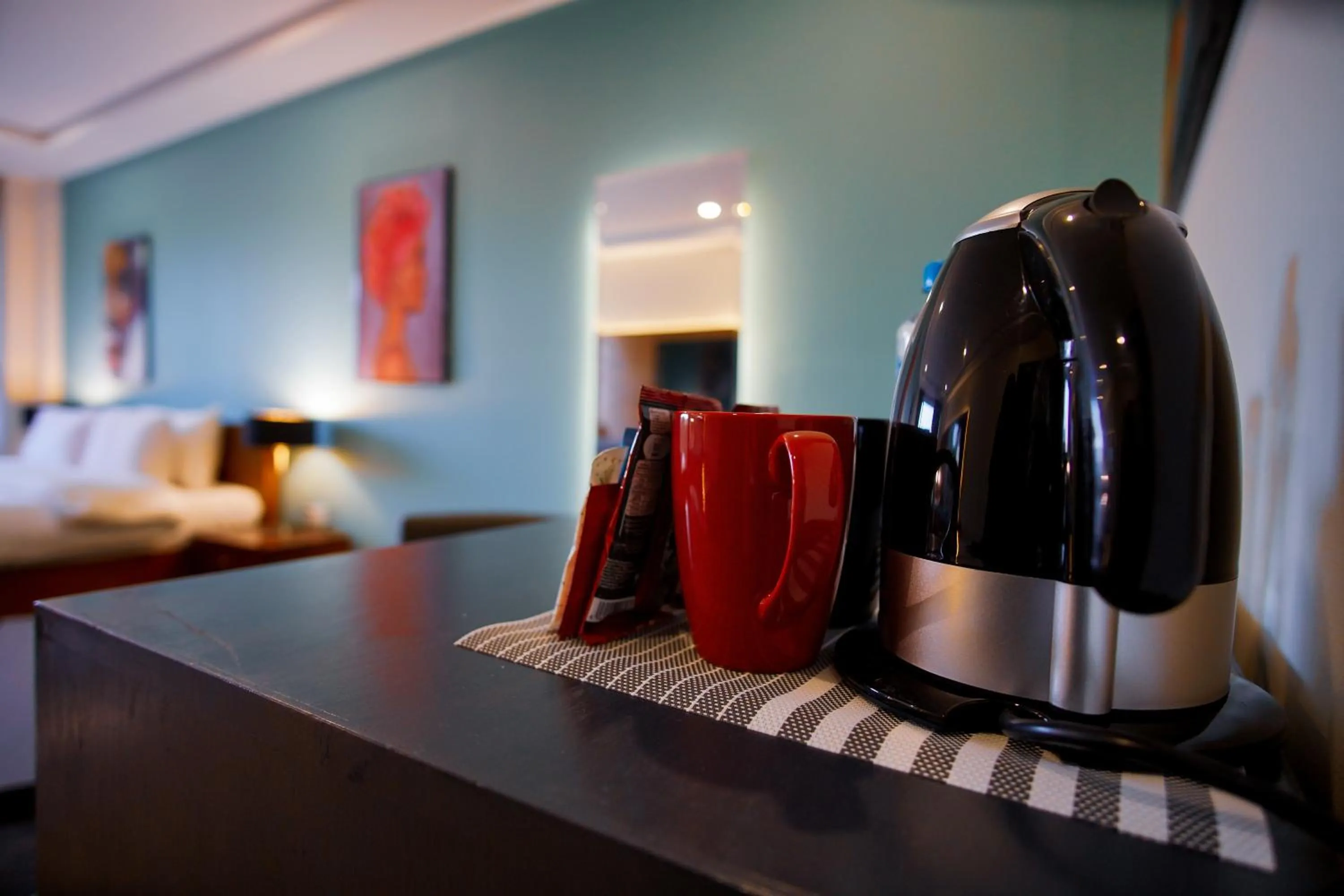 Bed in Roomy Signature Hotel, Islamabad