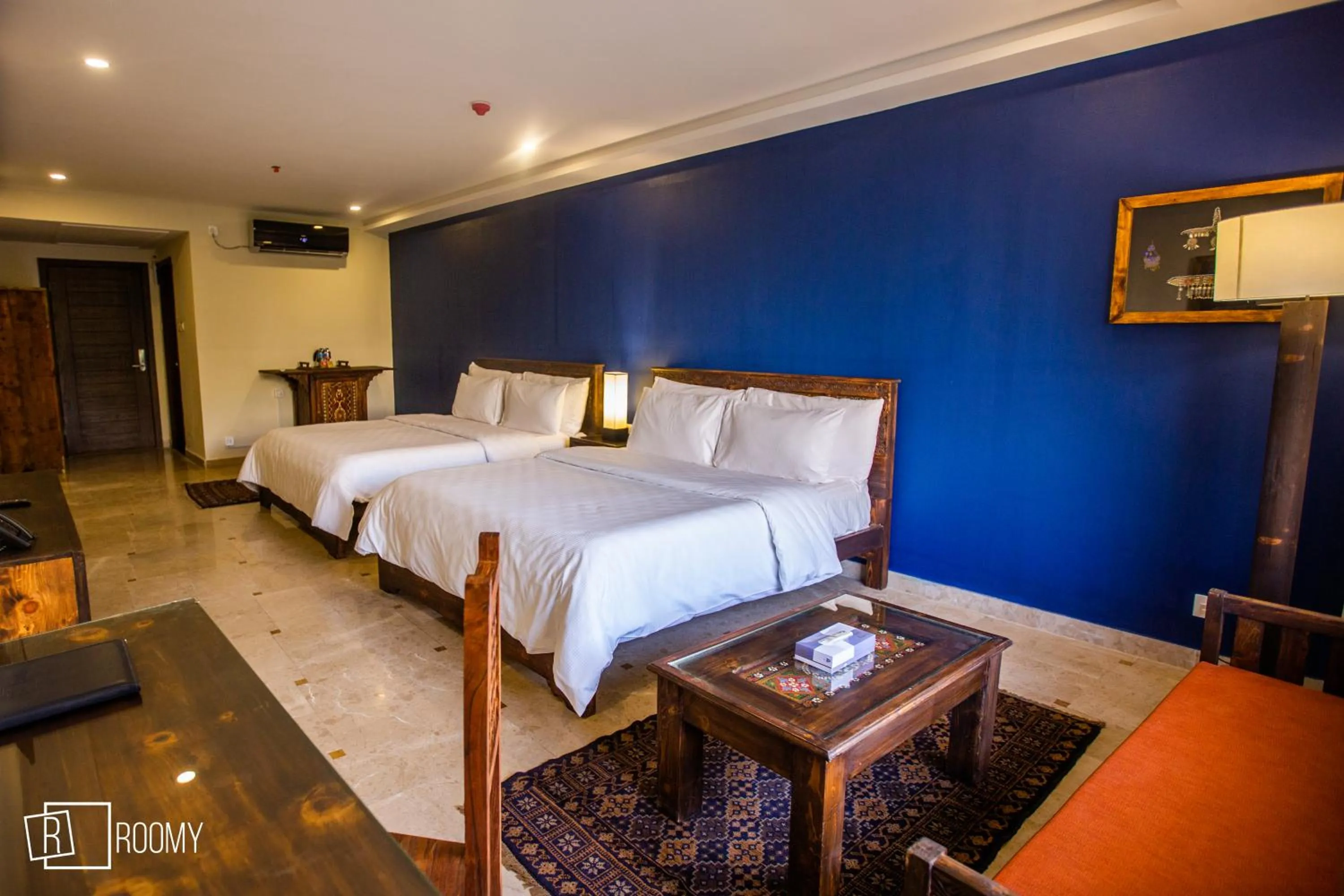 Bed in Roomy Signature Hotel, Islamabad