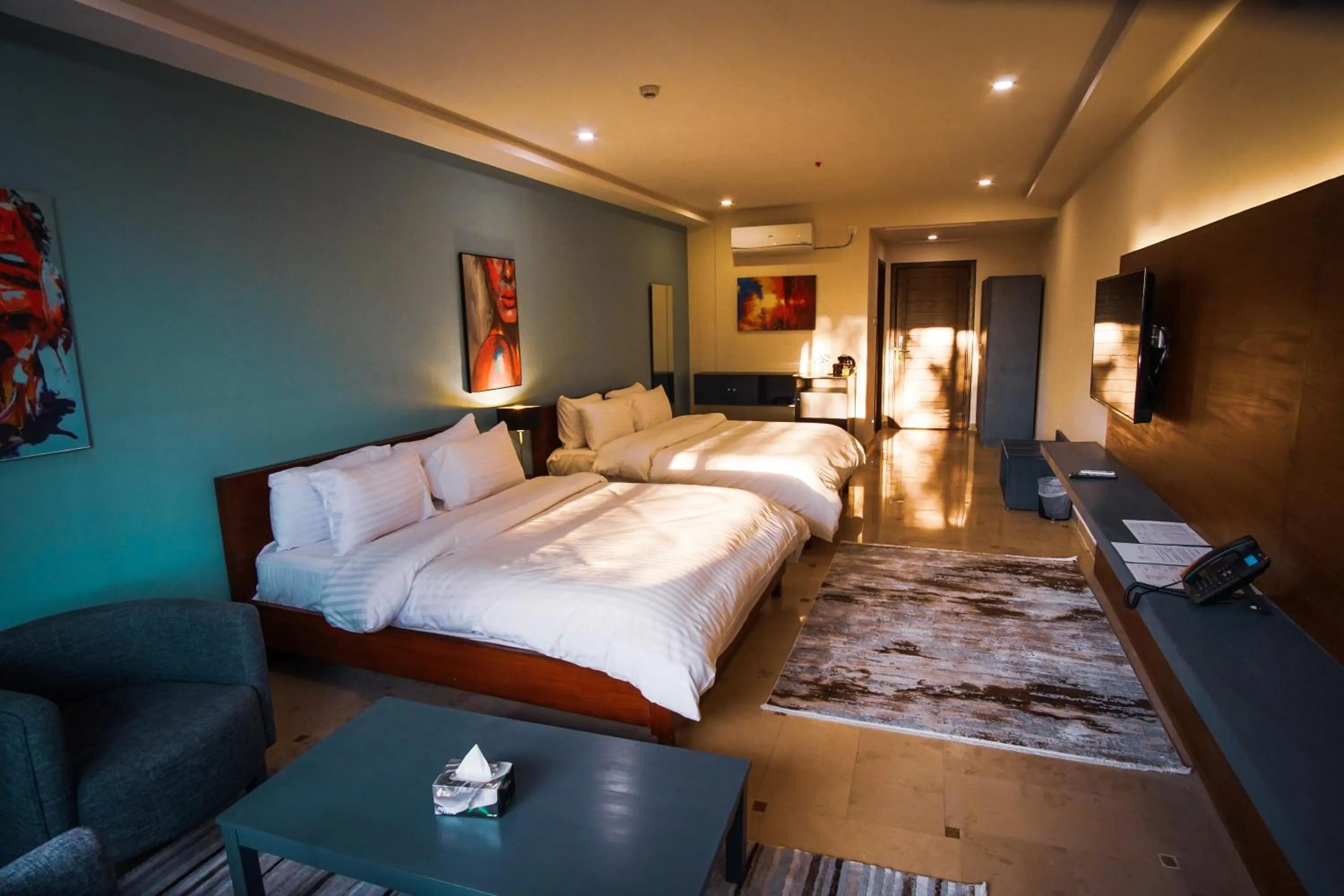 Bed in Roomy Signature Hotel, Islamabad