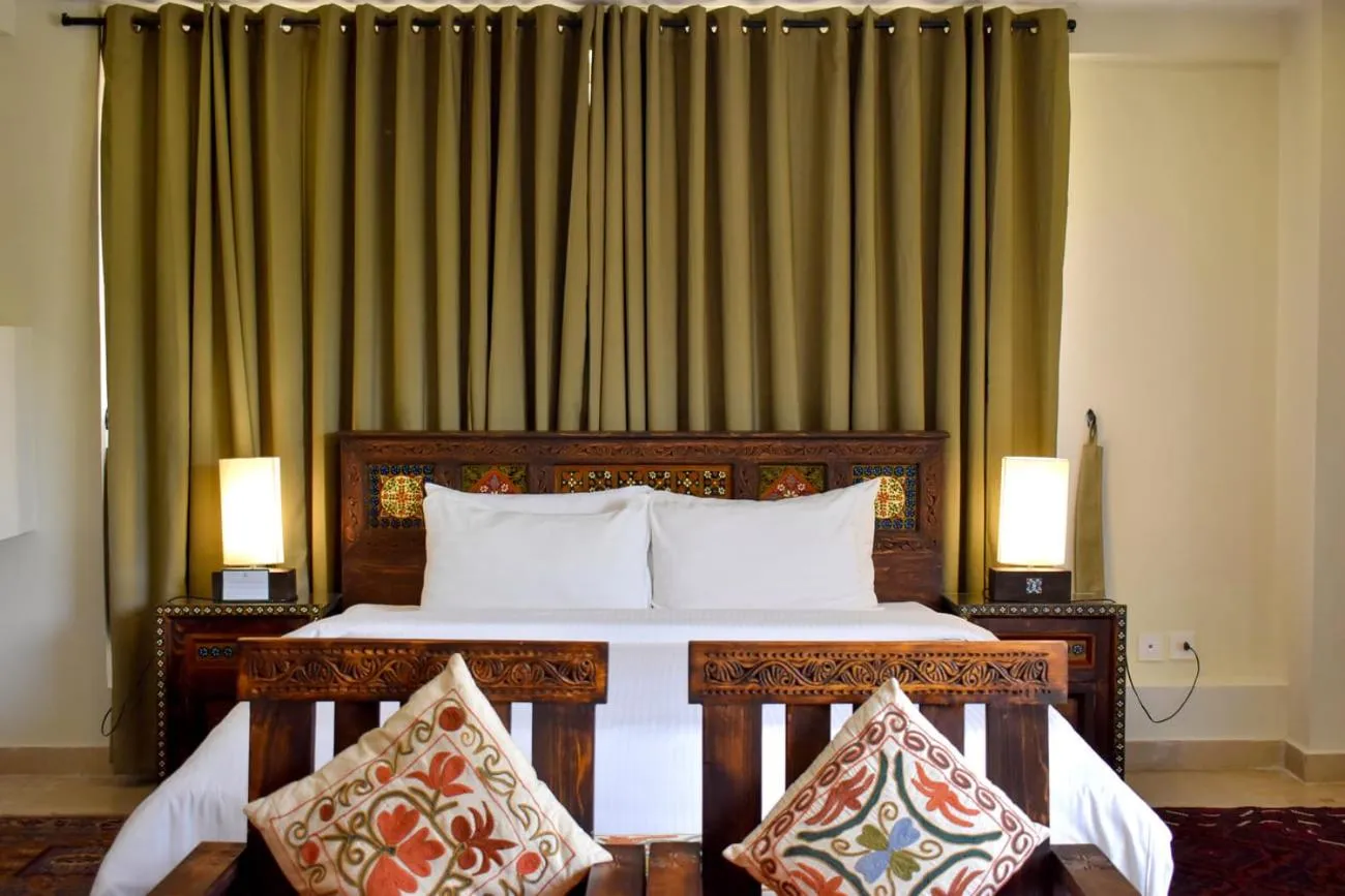 Bed in Roomy Signature Hotel, Islamabad