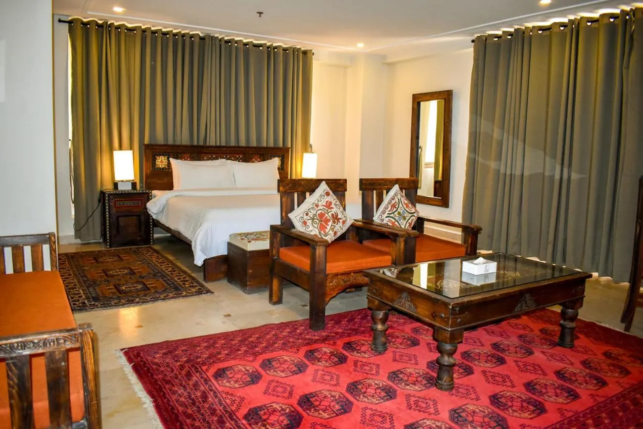 Bed in Roomy Signature Hotel, Islamabad