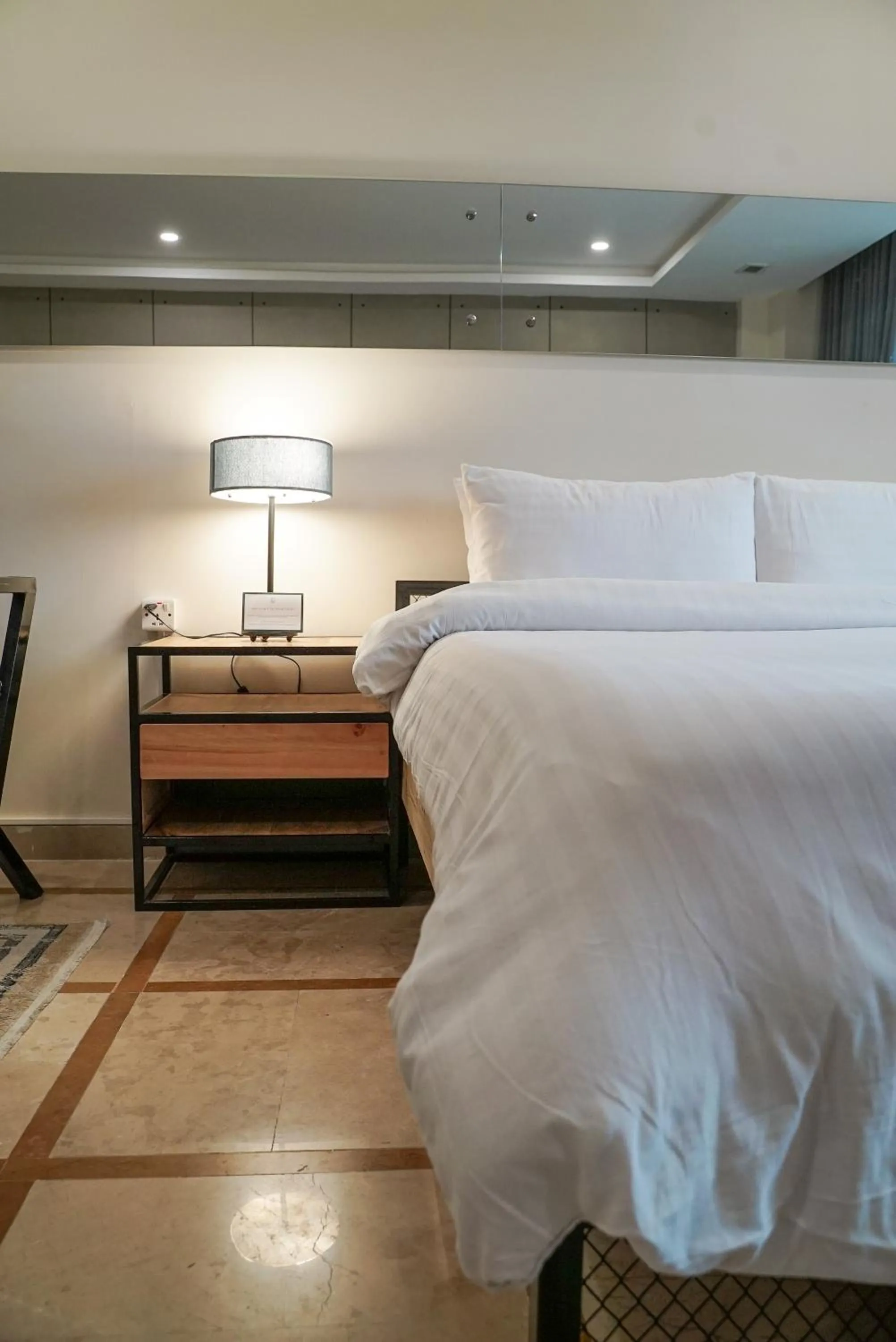 Bed in Roomy Signature Hotel, Islamabad