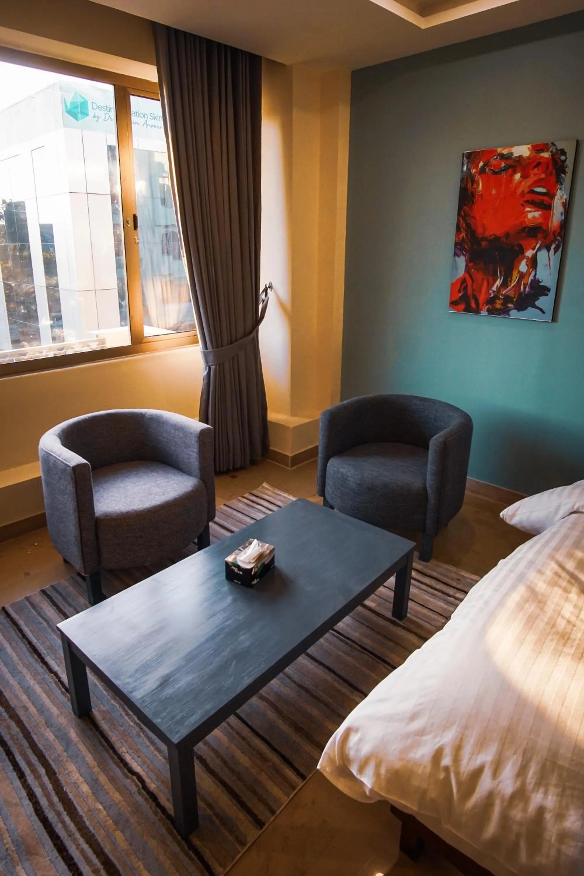 Bed in Roomy Signature Hotel, Islamabad