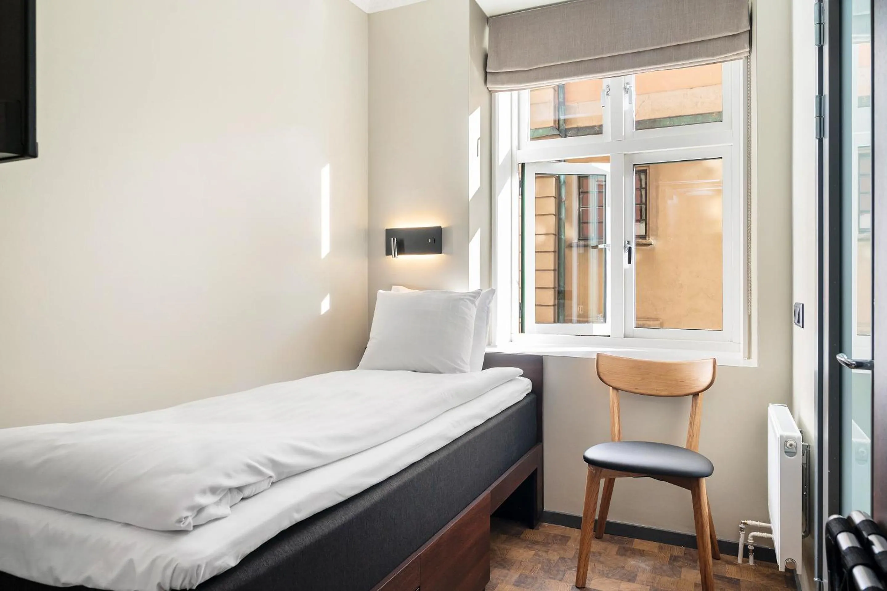 Bed in At Old Town Aparthotel