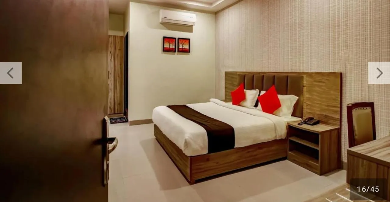 Bed in Hotel Sindhura Grand