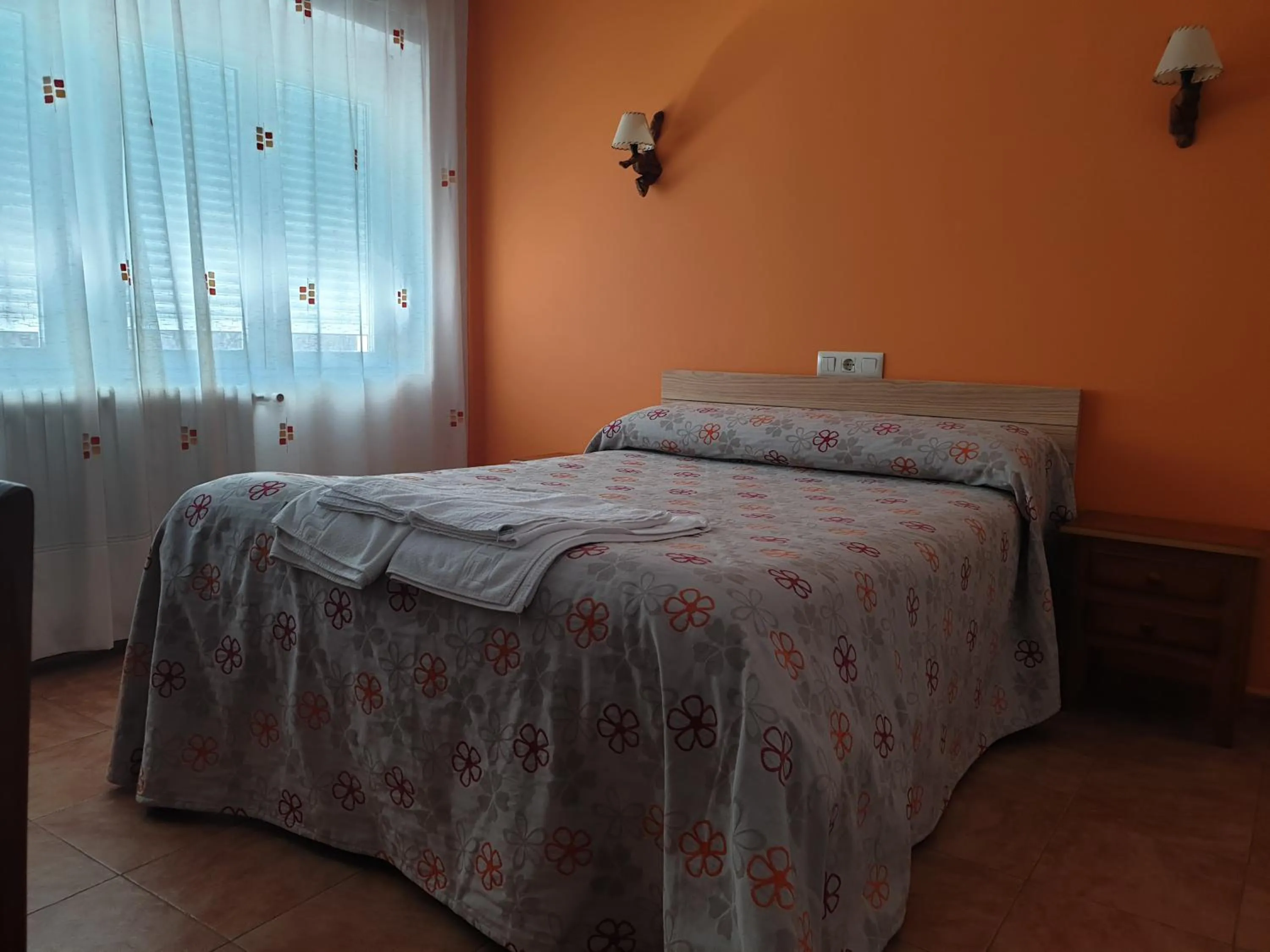 Bed in Hostal Río Mundo