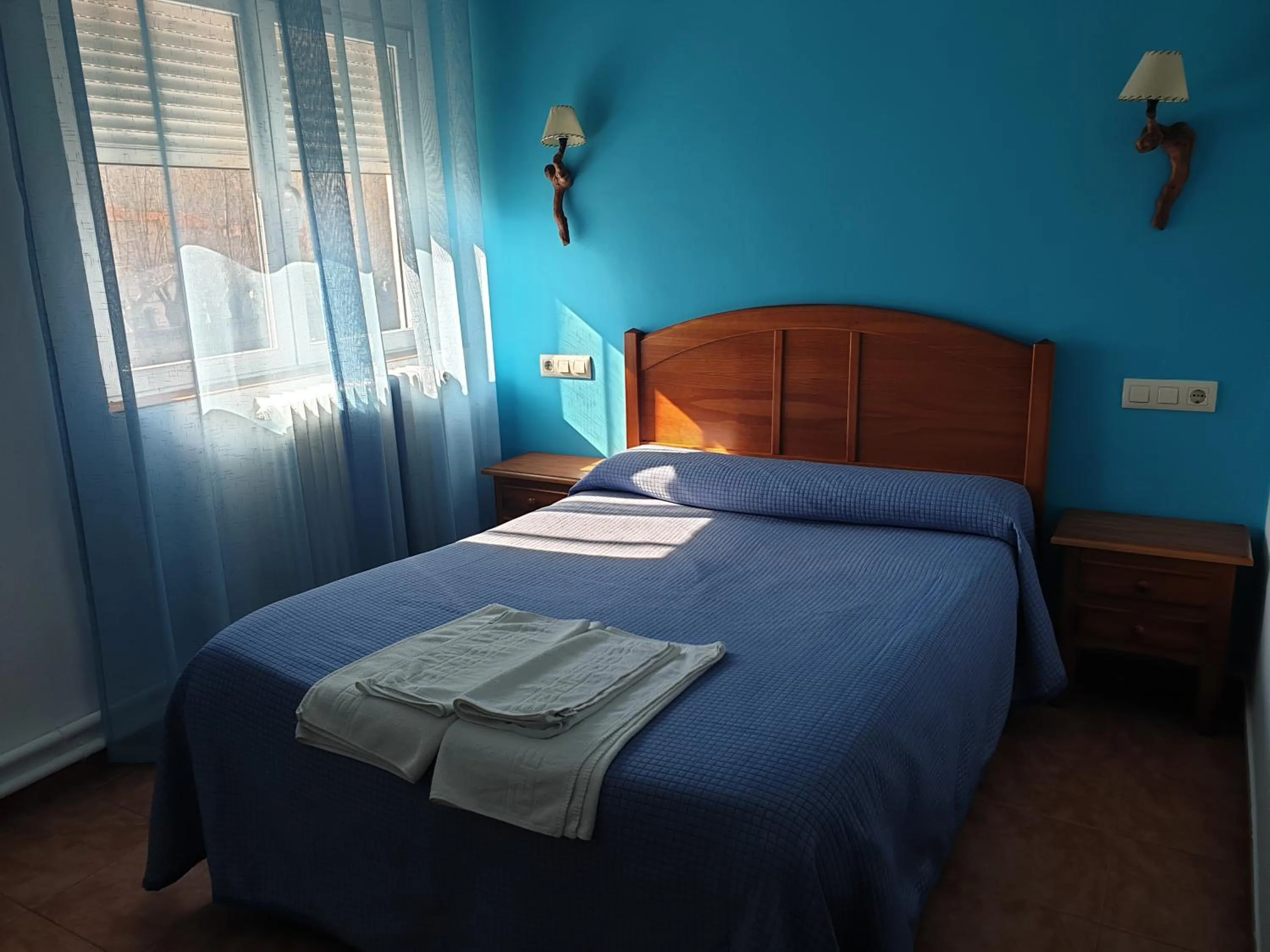 Bed in Hostal Río Mundo