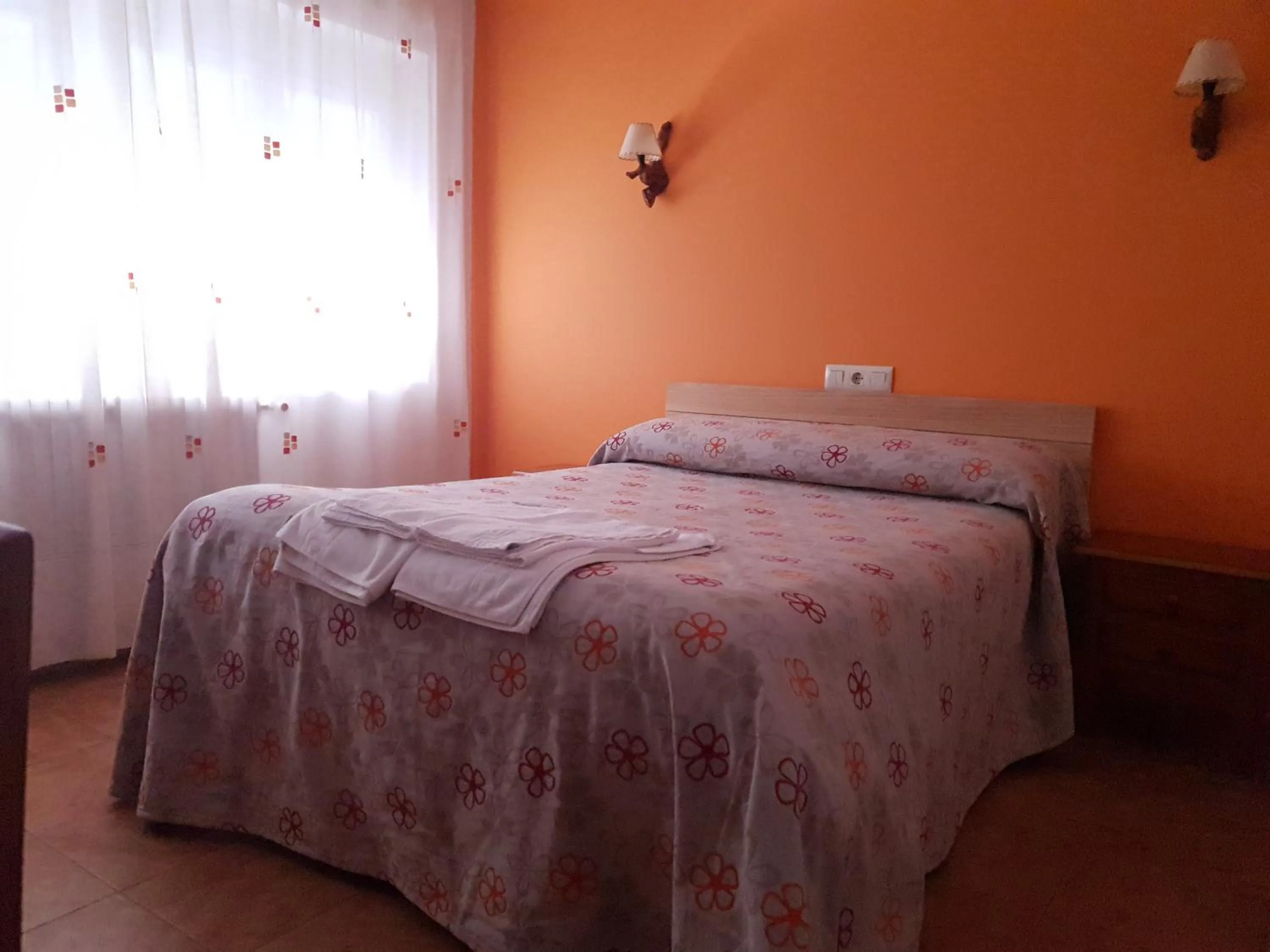 Bed in Hostal Río Mundo
