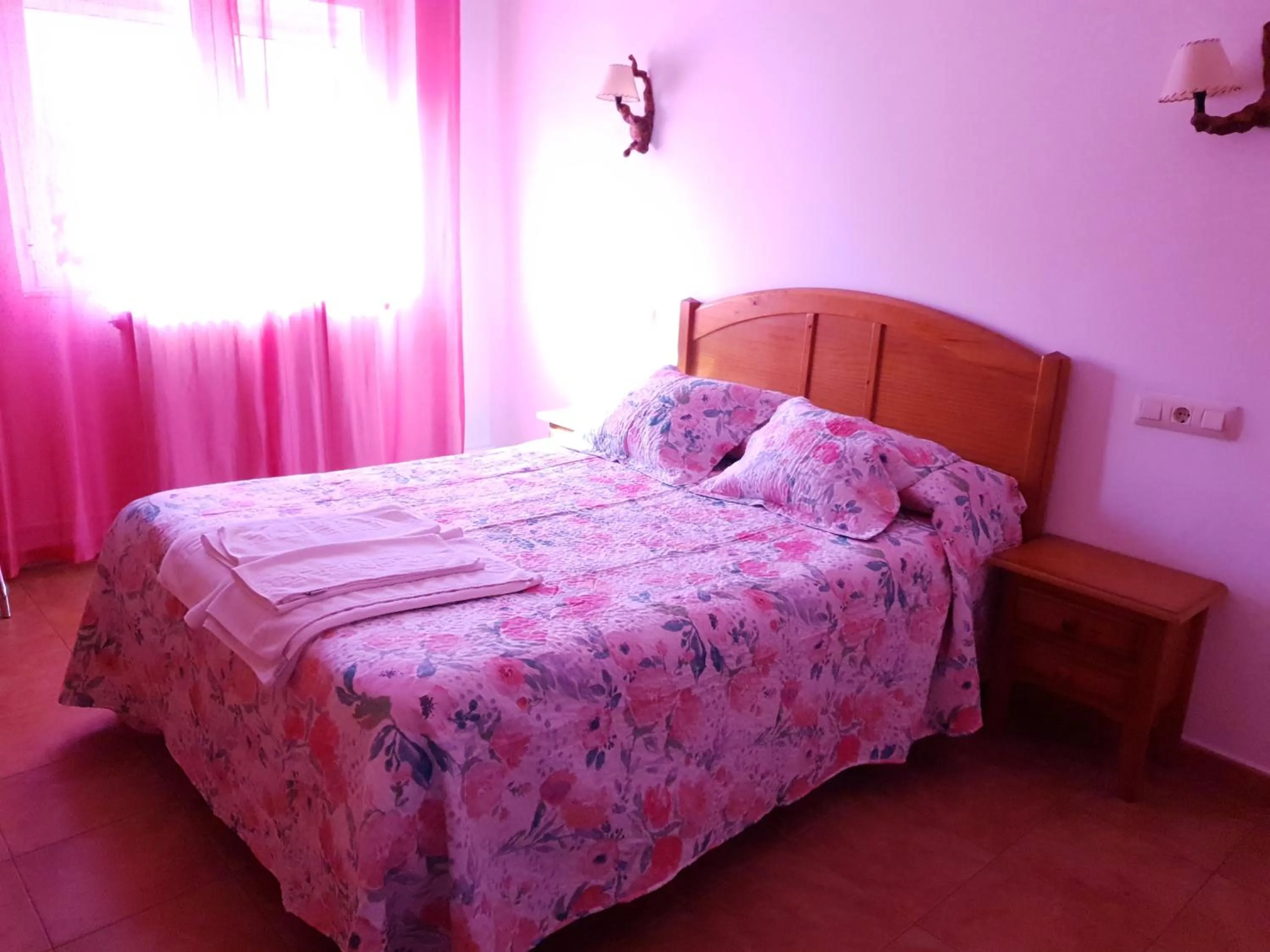 Bed in Hostal Río Mundo