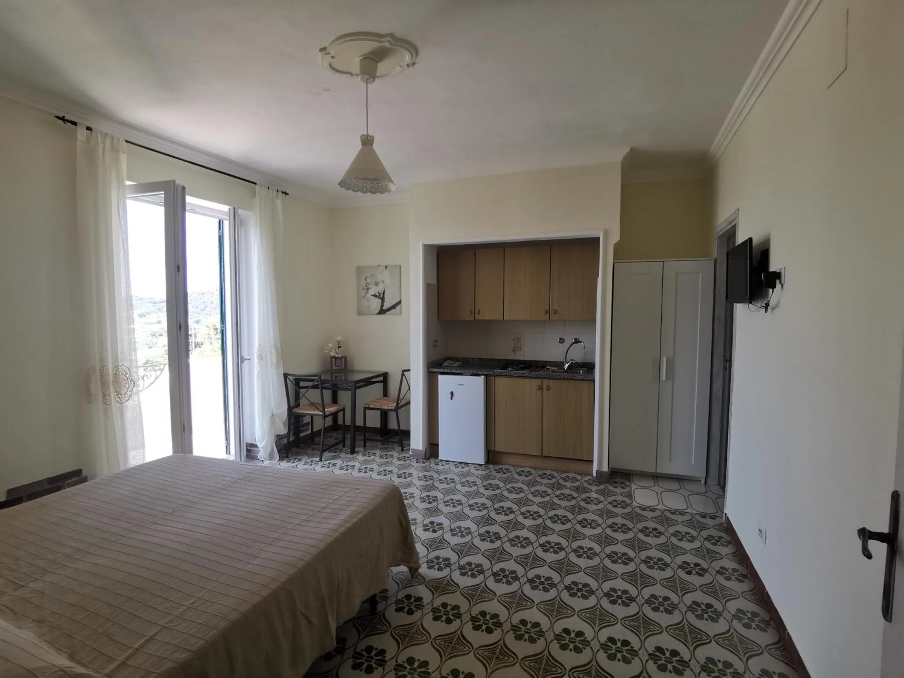 Kitchen or kitchenette, Bed in Villa Olivia Residence Ischia - Monolocali e Bilocali nel Verde con Piscine e Vista Mare