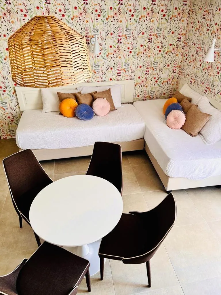 Living room, Bed in Palazzo Matà Boutique Hotel