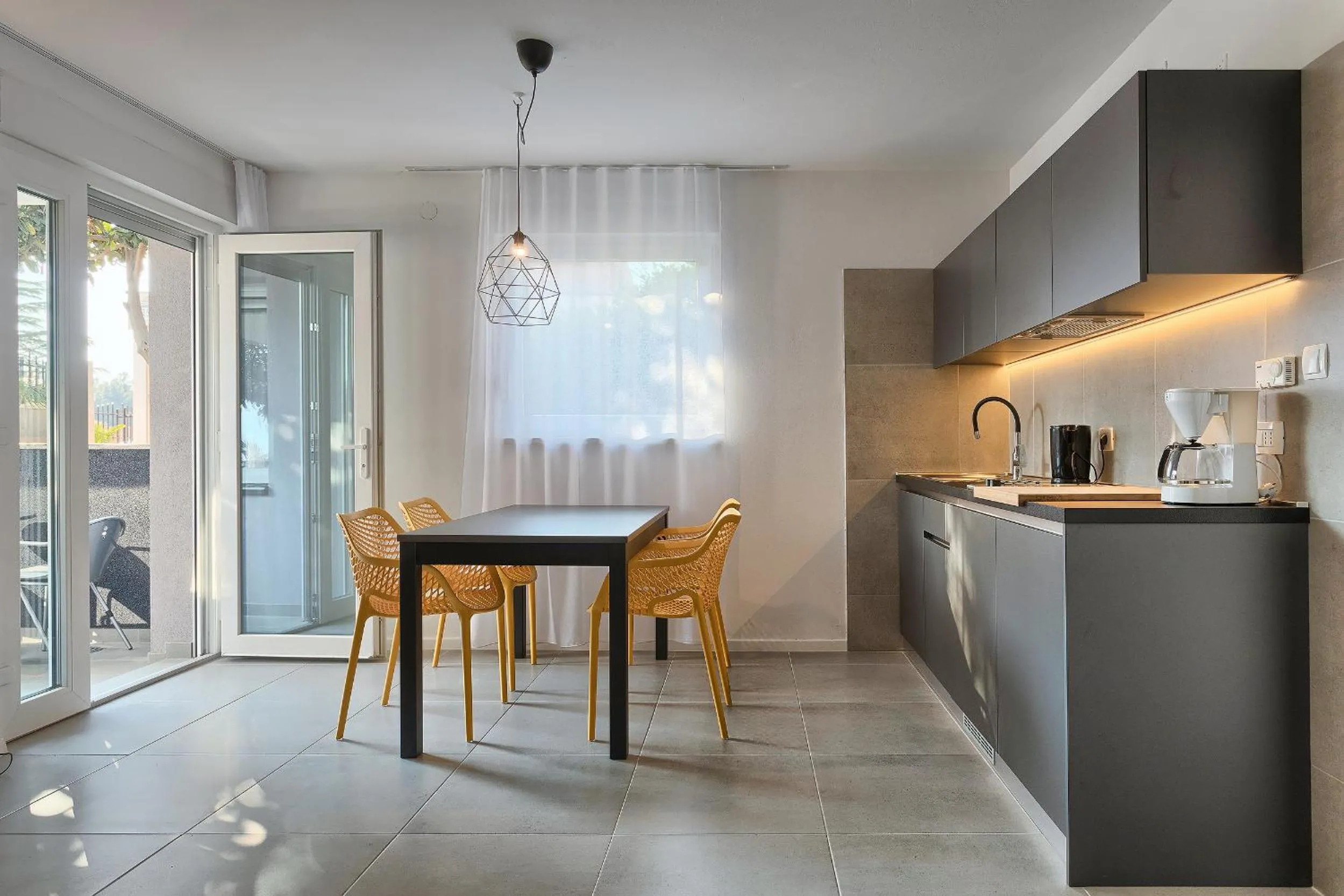 Kitchen or kitchenette in Astinian apartments Jadranka