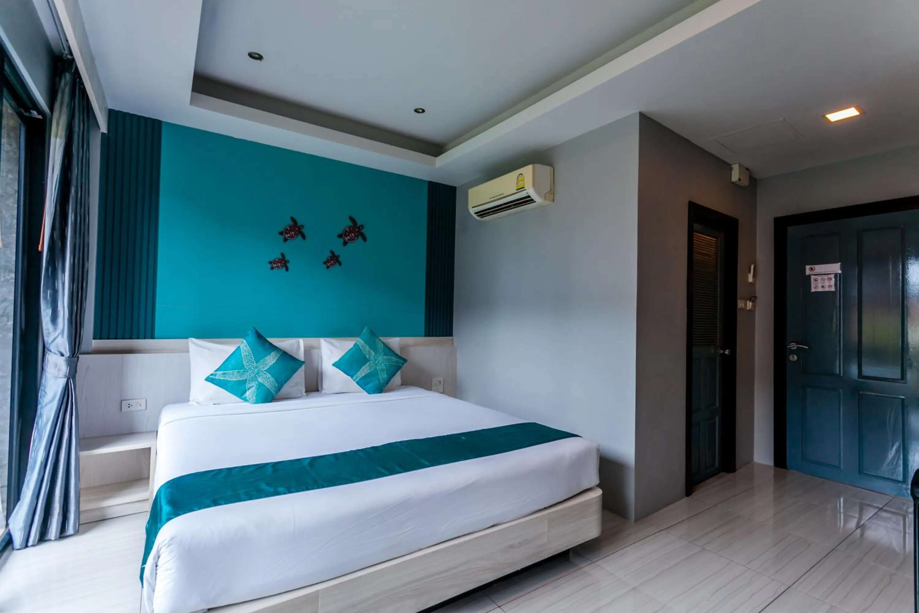 Bedroom, Bed in Coco Bella Hotel