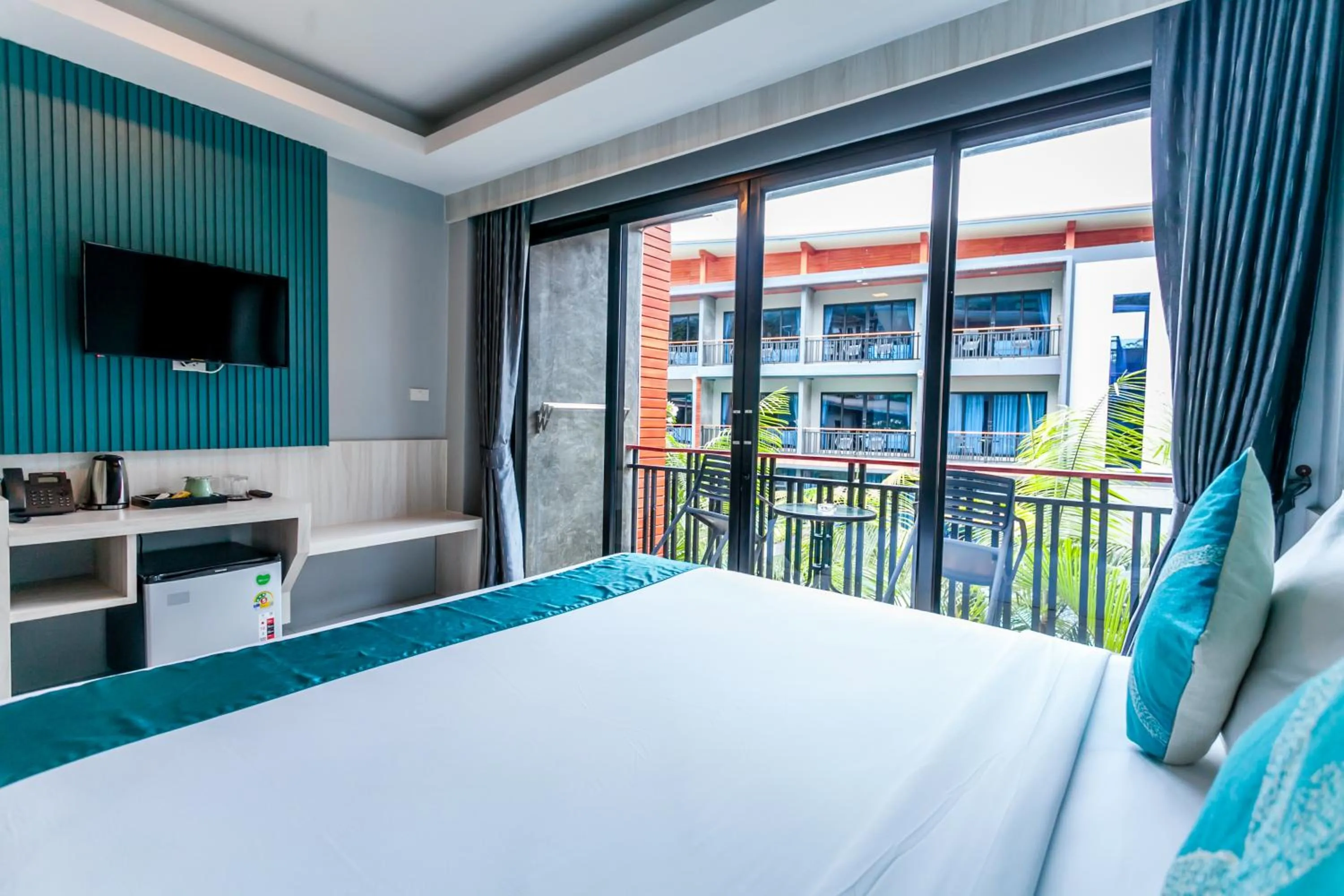 Bed in Coco Bella Hotel