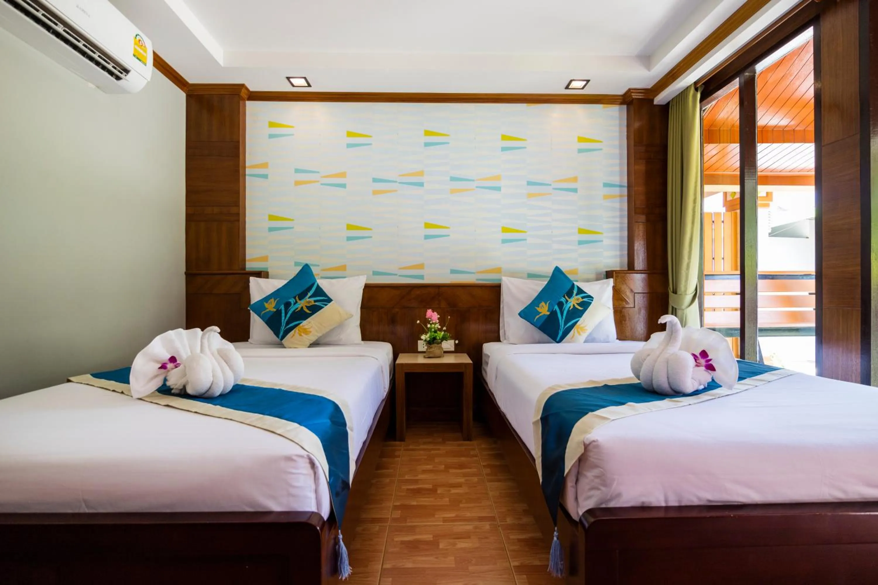 Bed in Coco Bella Hotel