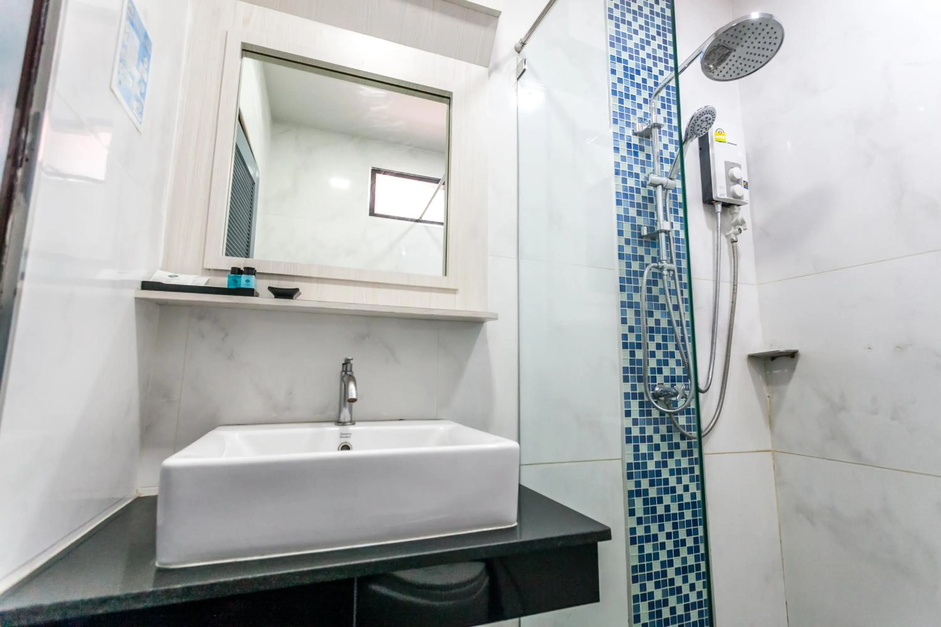 Shower in Coco Bella Hotel