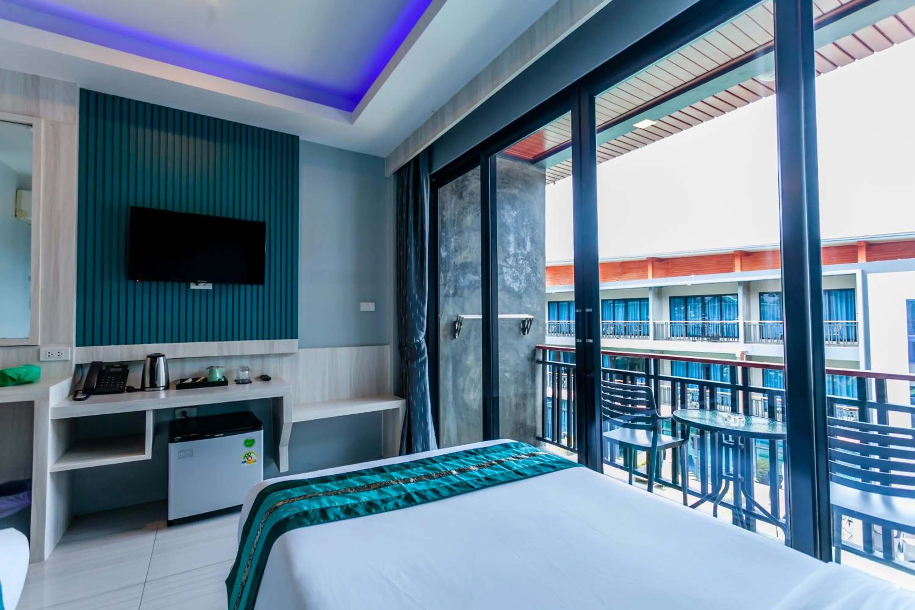 Bed in Coco Bella Hotel