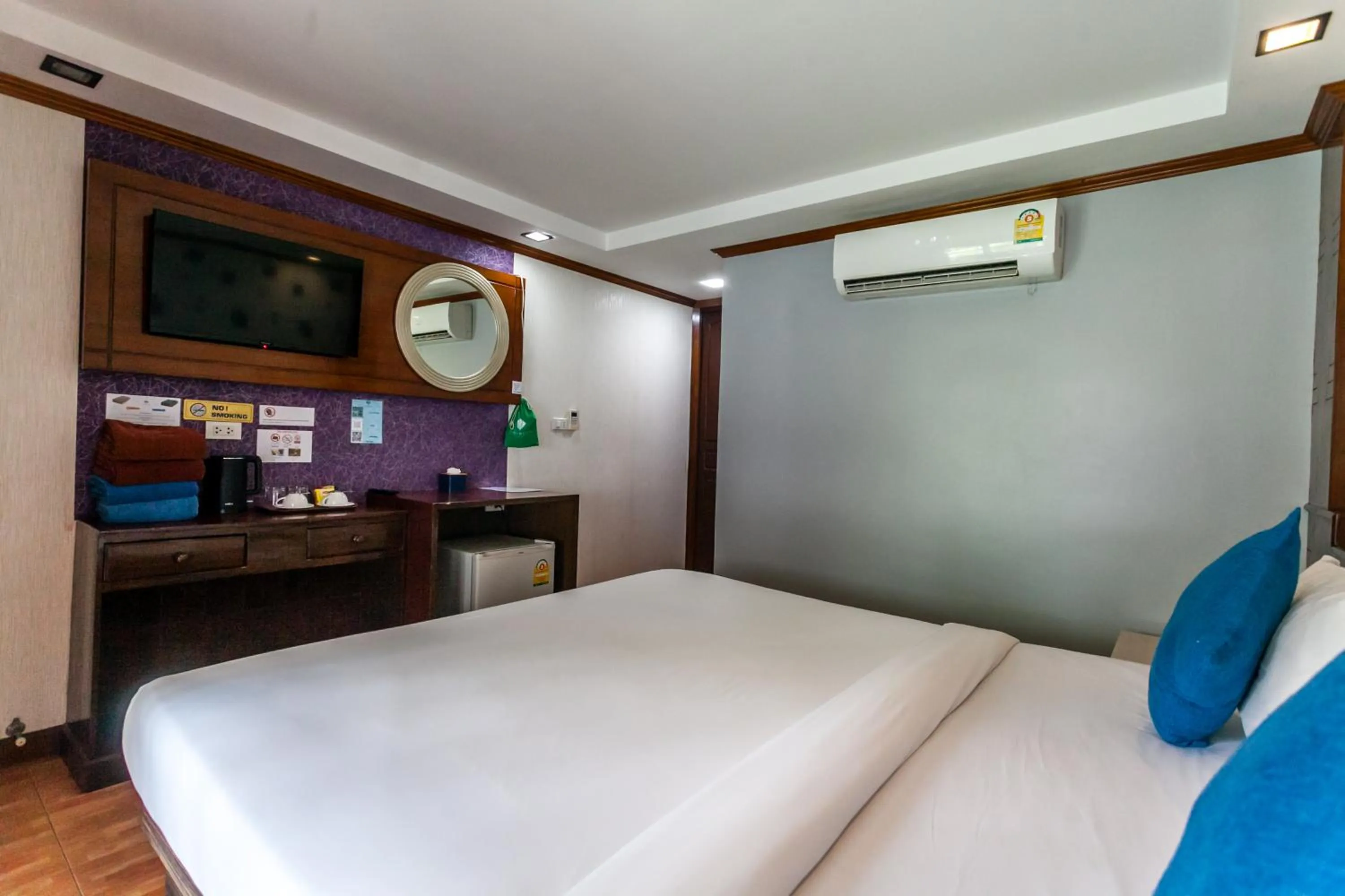 Bed in Coco Bella Hotel