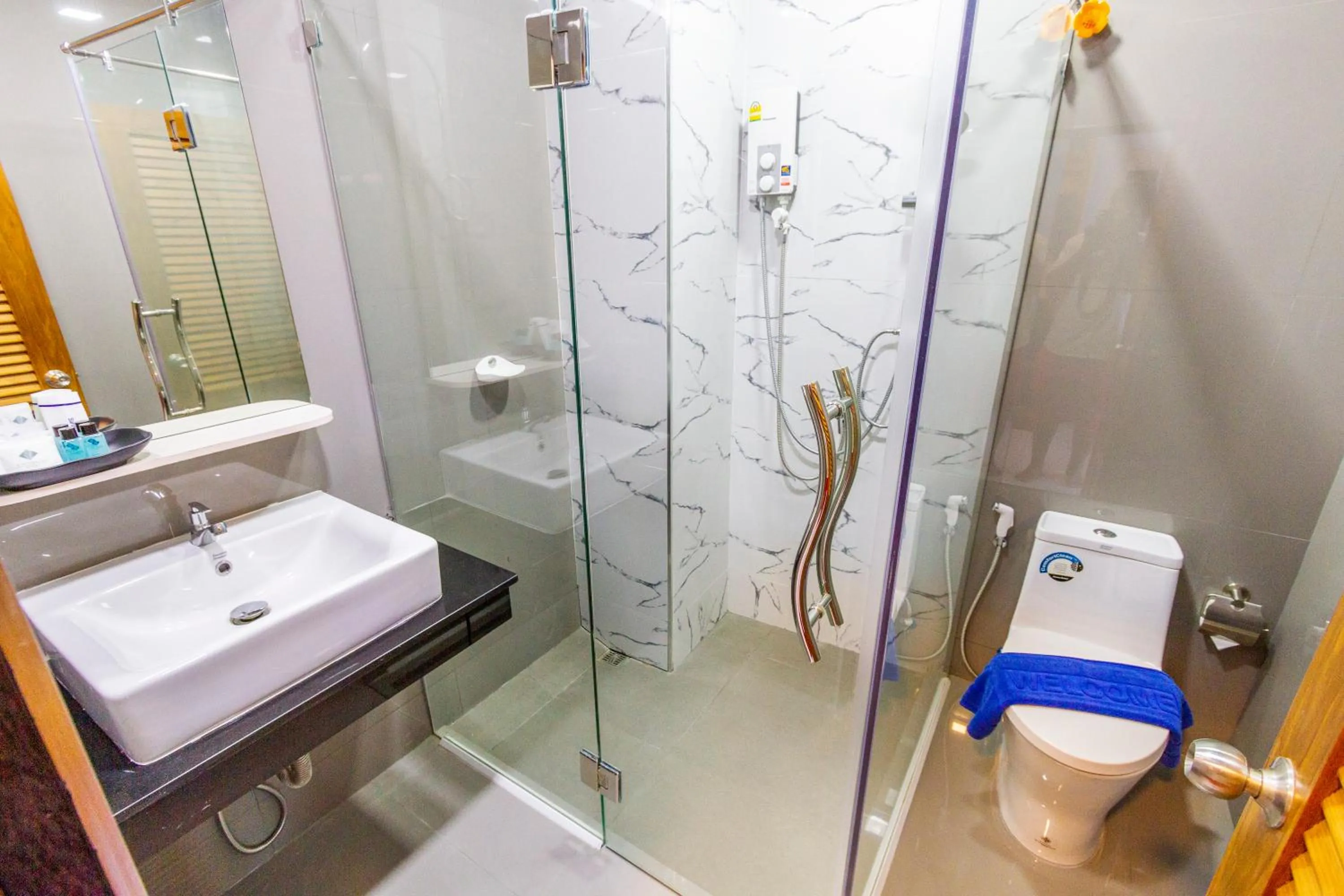 Toilet in Coco Bella Hotel