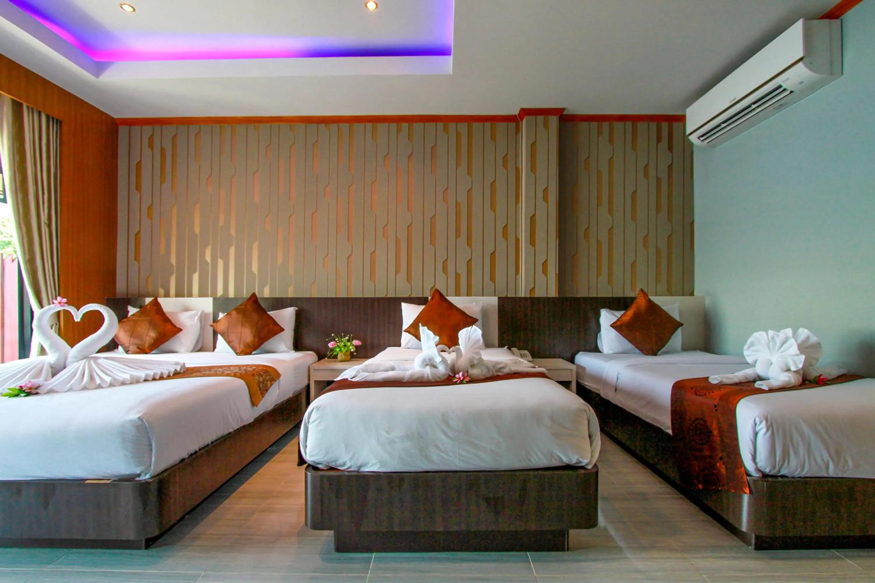 Bed in Coco Bella Hotel