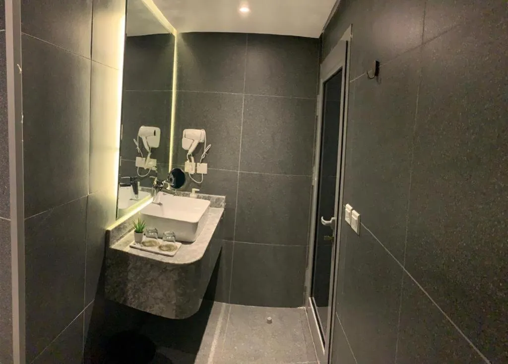 Bathroom in ساس رتل للوحدات السكنية المفروشة