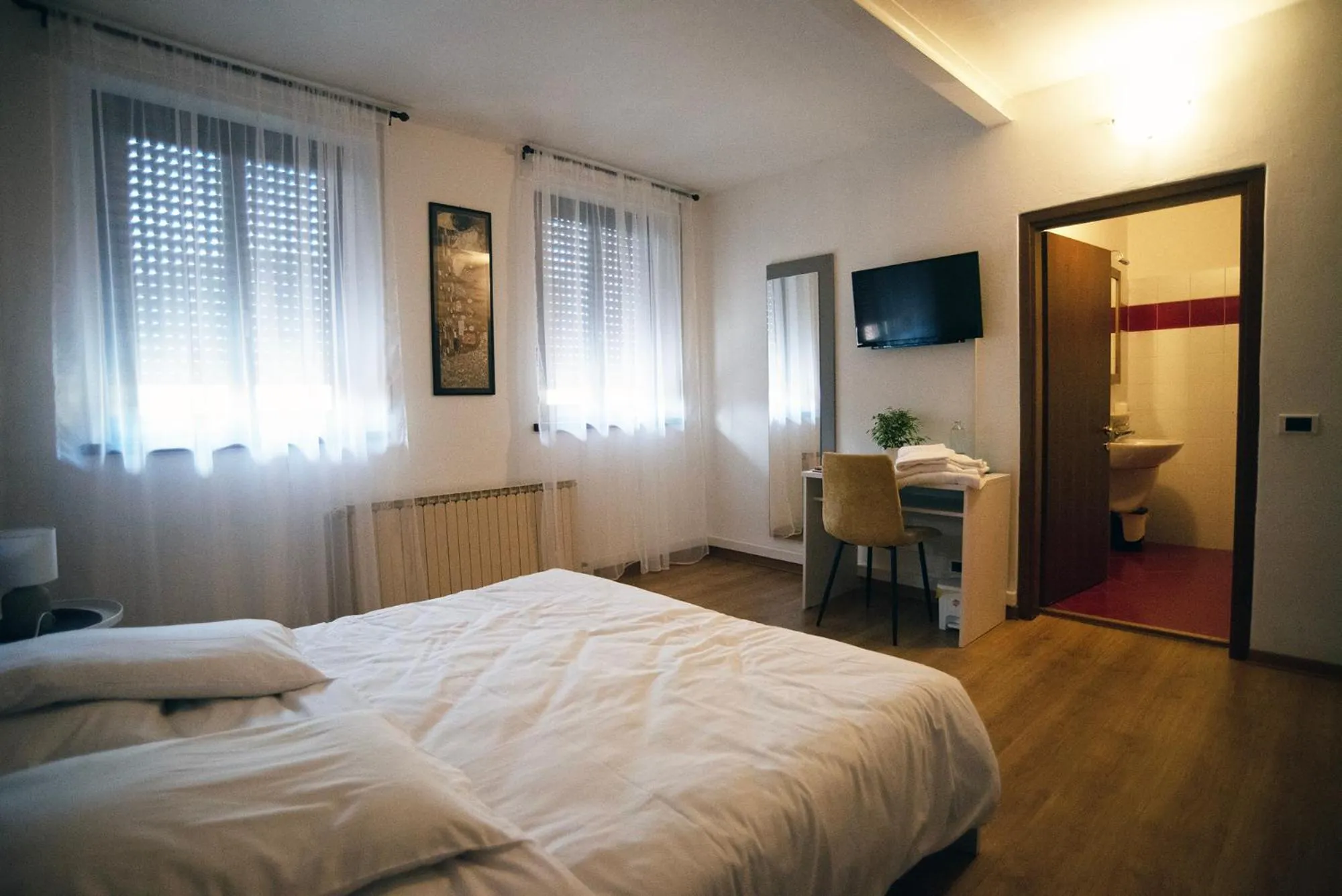 Bed in Albergo Alla Cesa