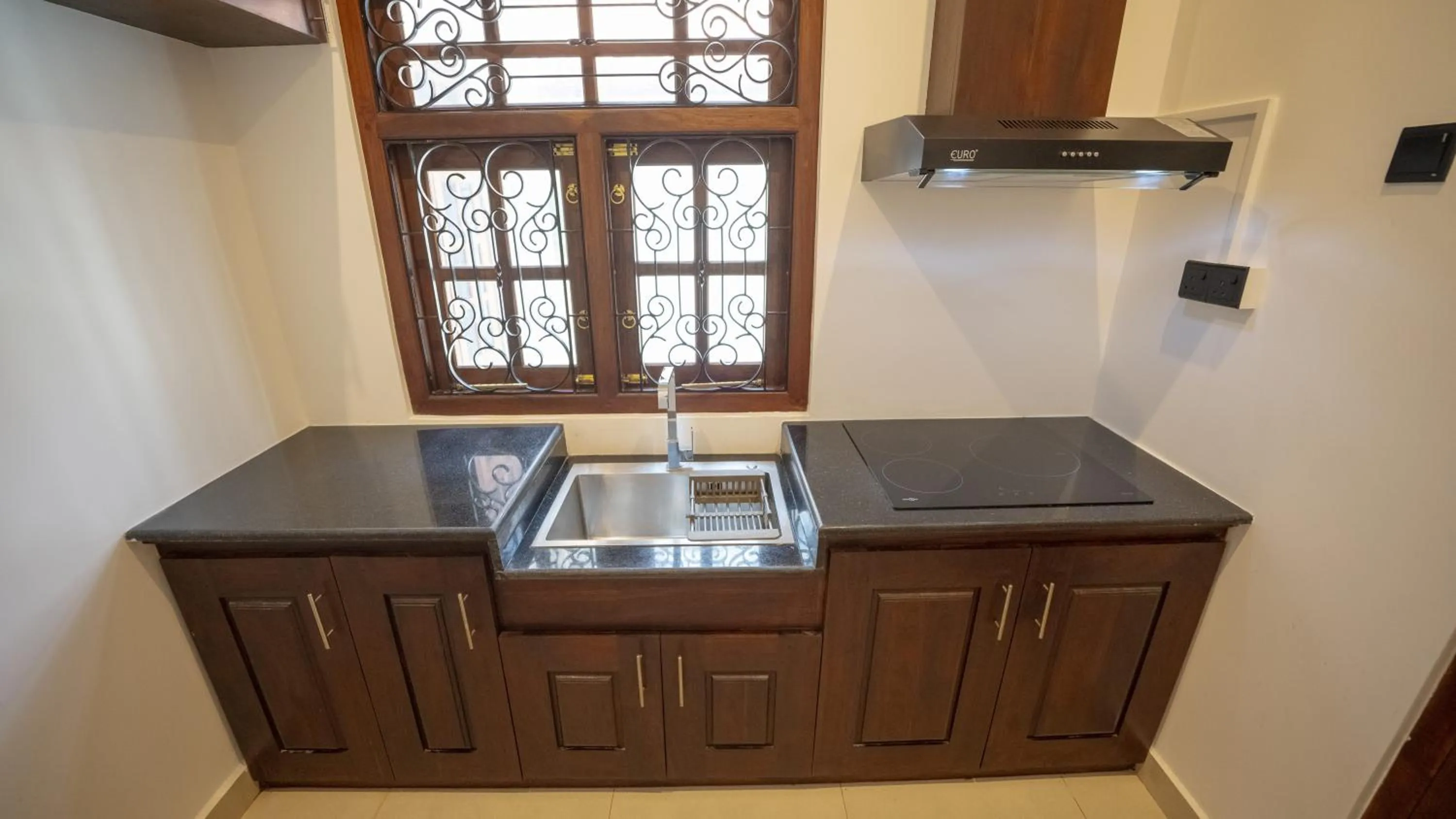 Kitchen or kitchenette in JAMUNA VILLA