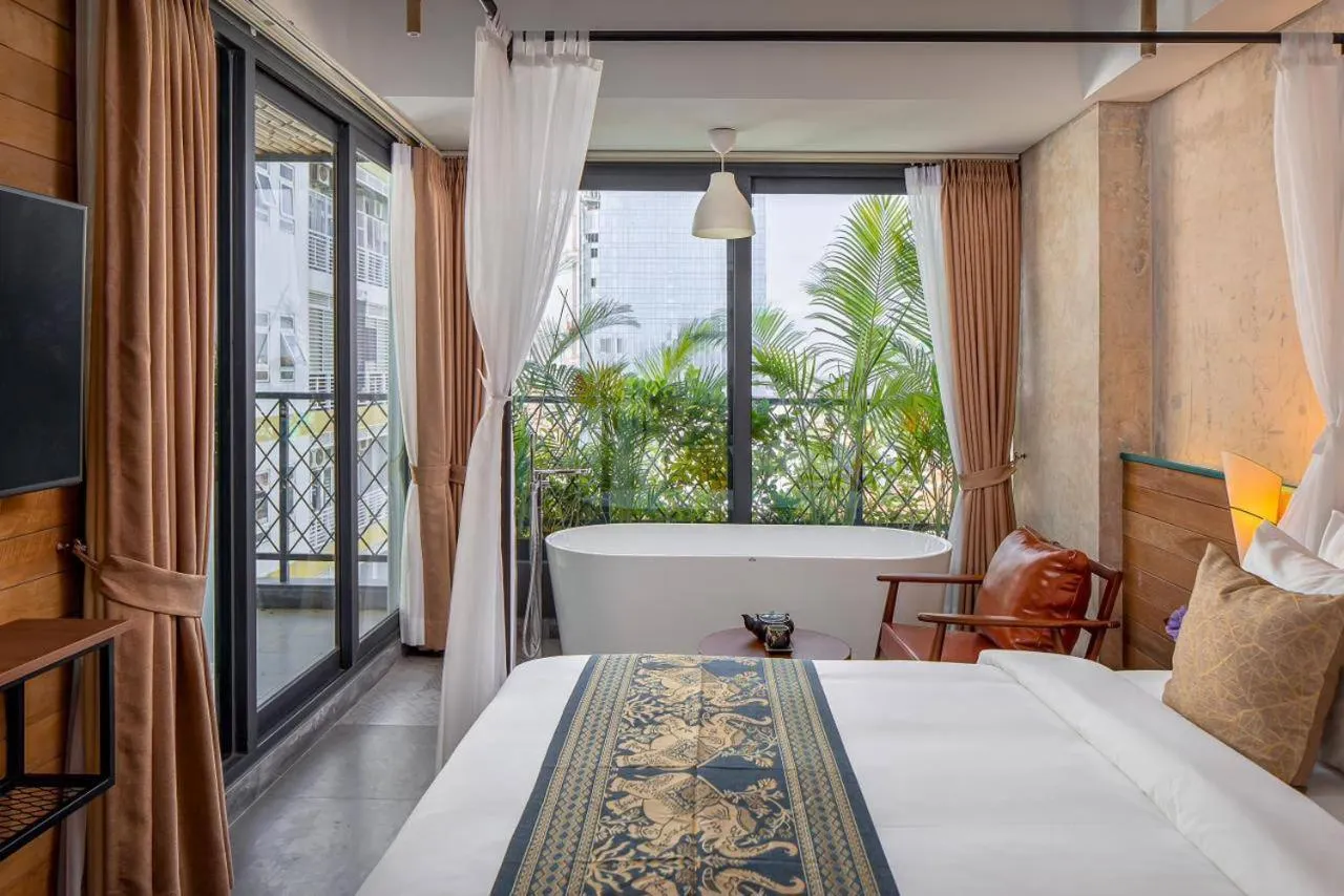 Bed in CHECK inn Phnom Penh Royal Palace