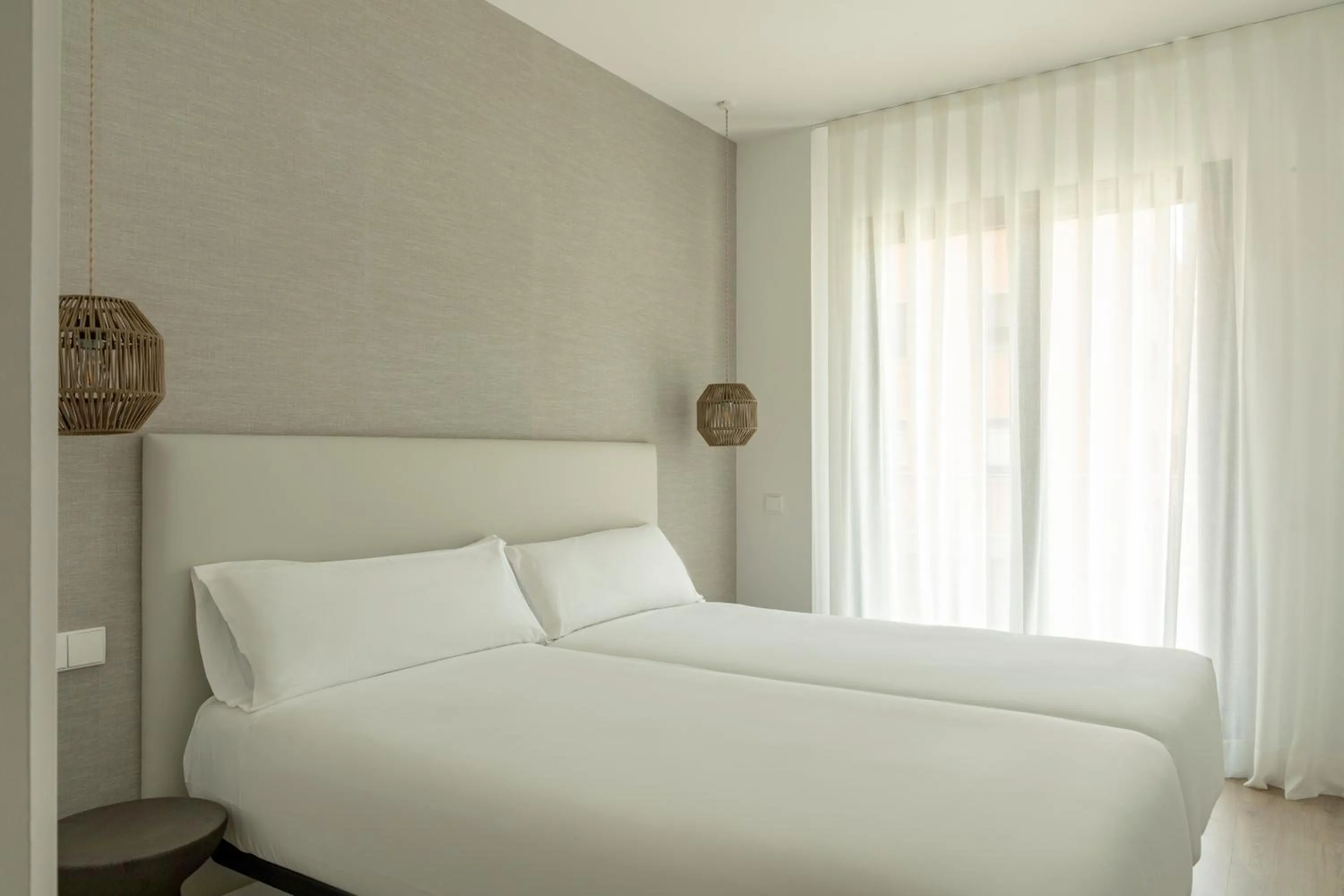 Bed in Europa Apartments