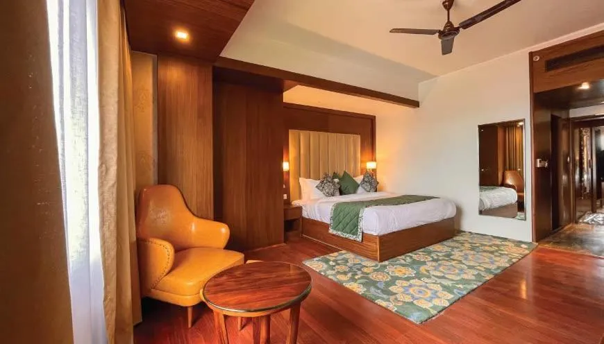 Bed in WelcomHeritage Grand, Srinagar