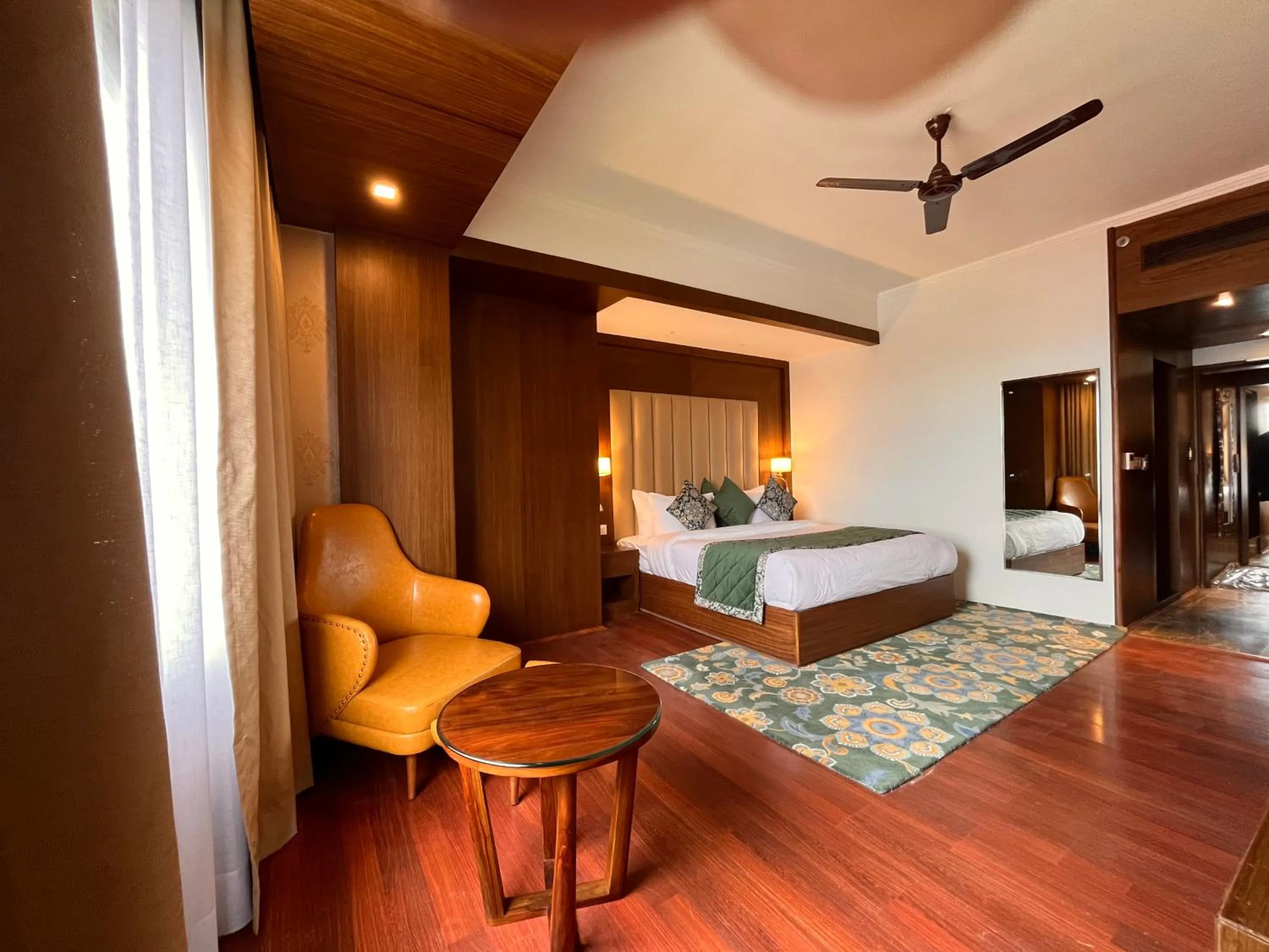 Bed in WelcomHeritage Grand, Srinagar