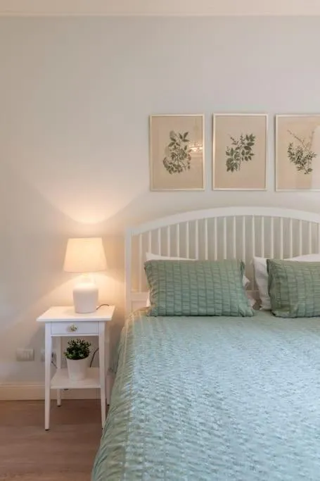 Bed in Il Giardino Garden View Apartment