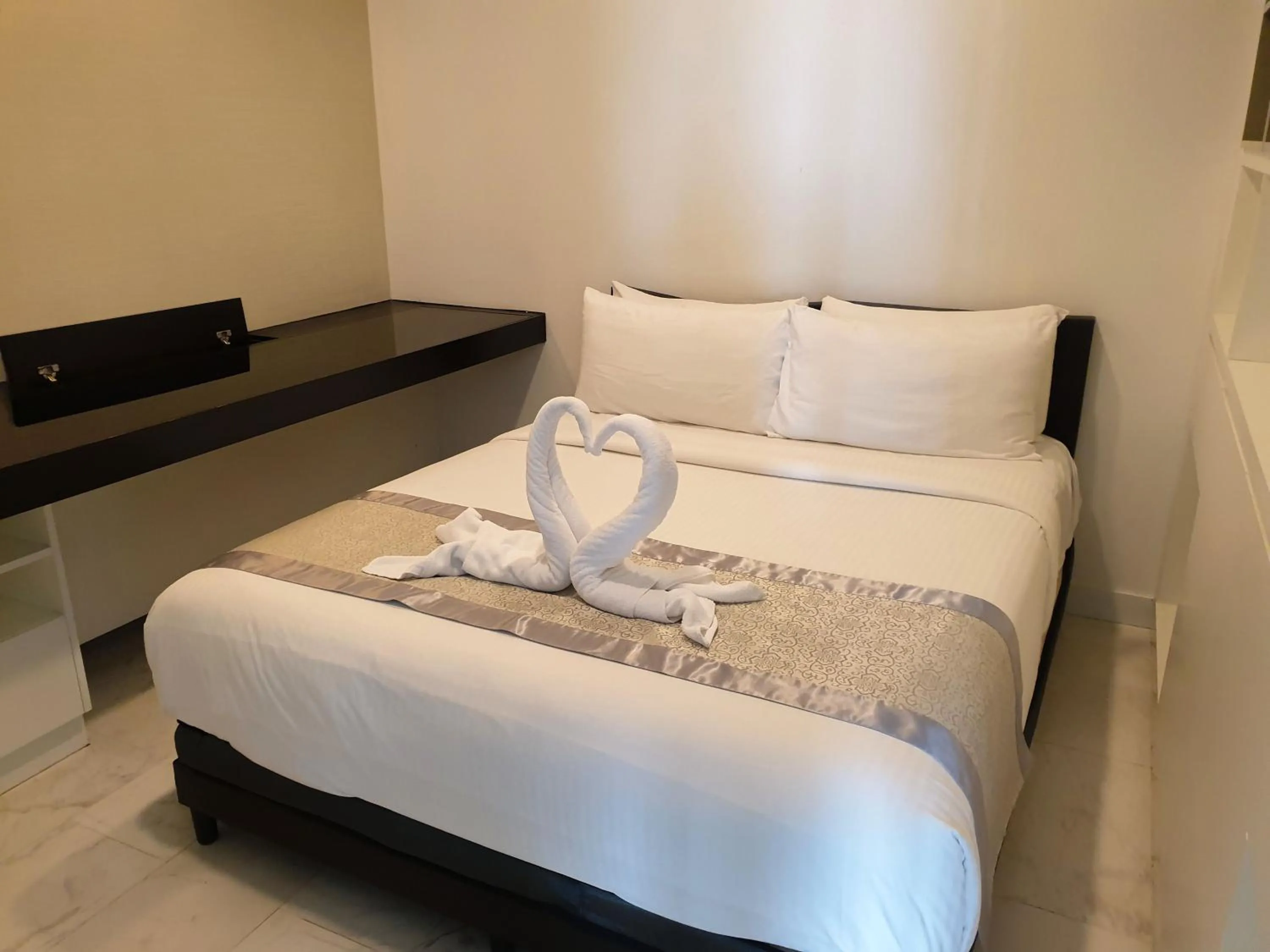 Bed in Sidemen Suites at Platinum KLCC