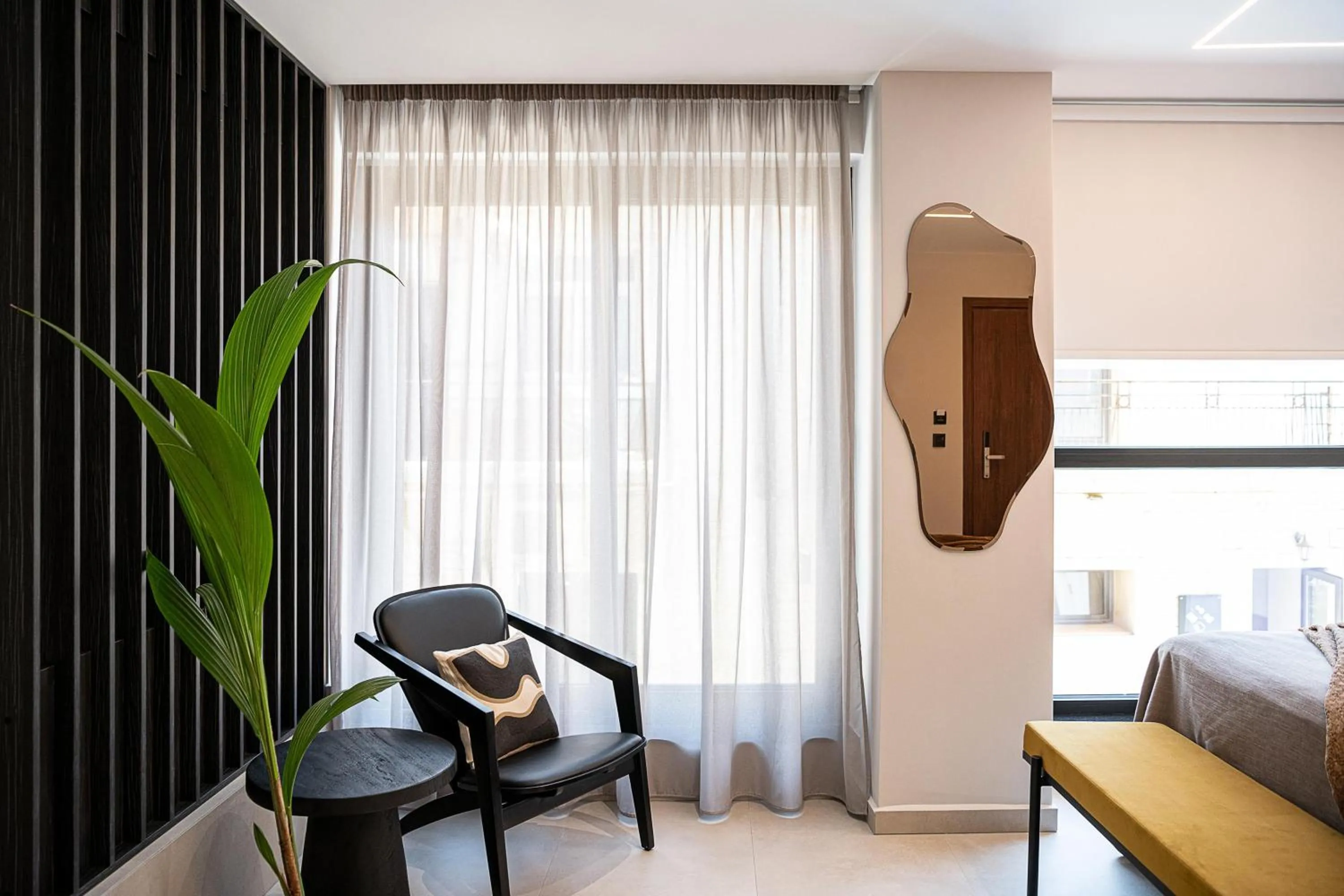 Seating area in Theta Boutique Hotel