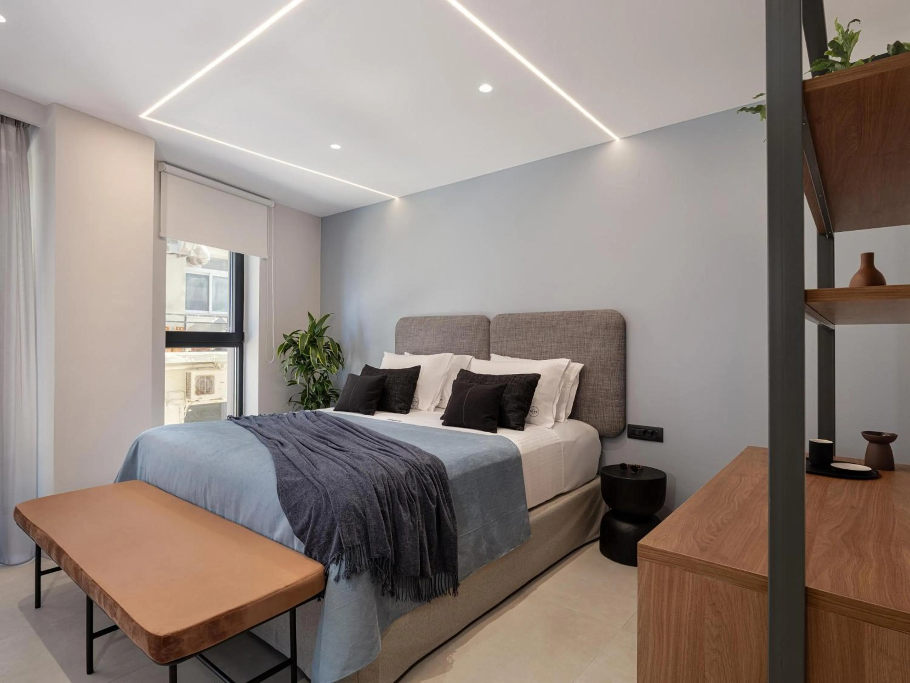 Bed in Theta Boutique Hotel