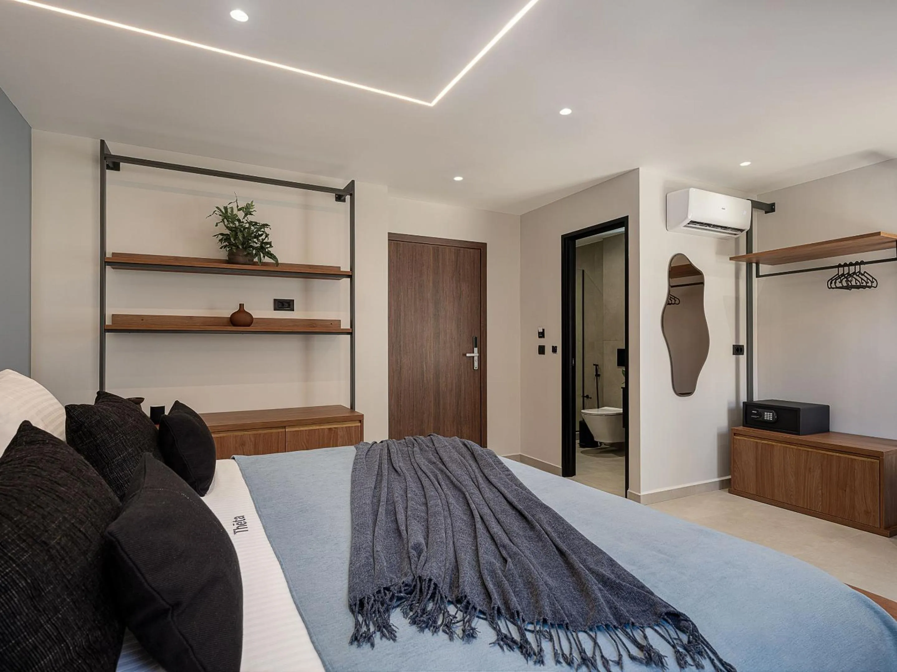 Bed in Theta Boutique Hotel