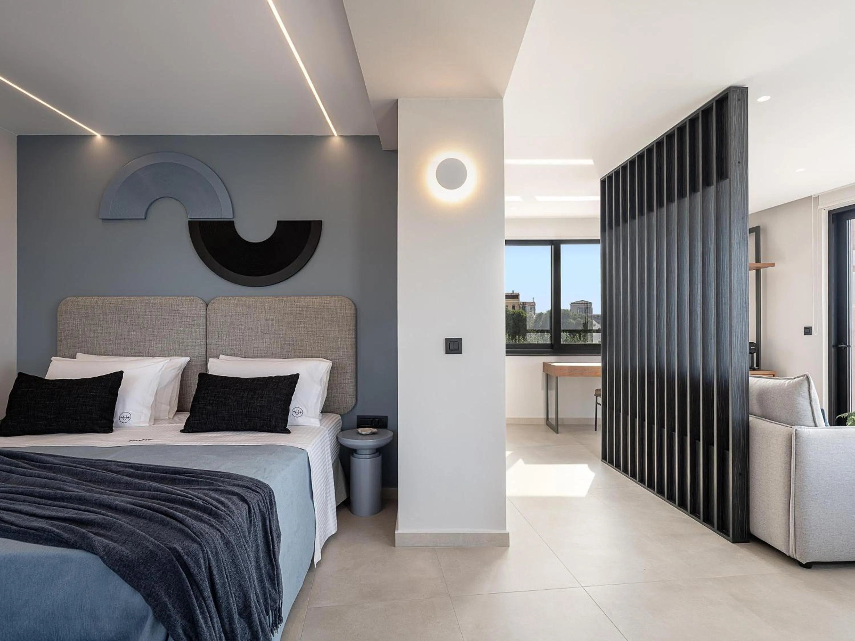 Bed in Theta Boutique Hotel