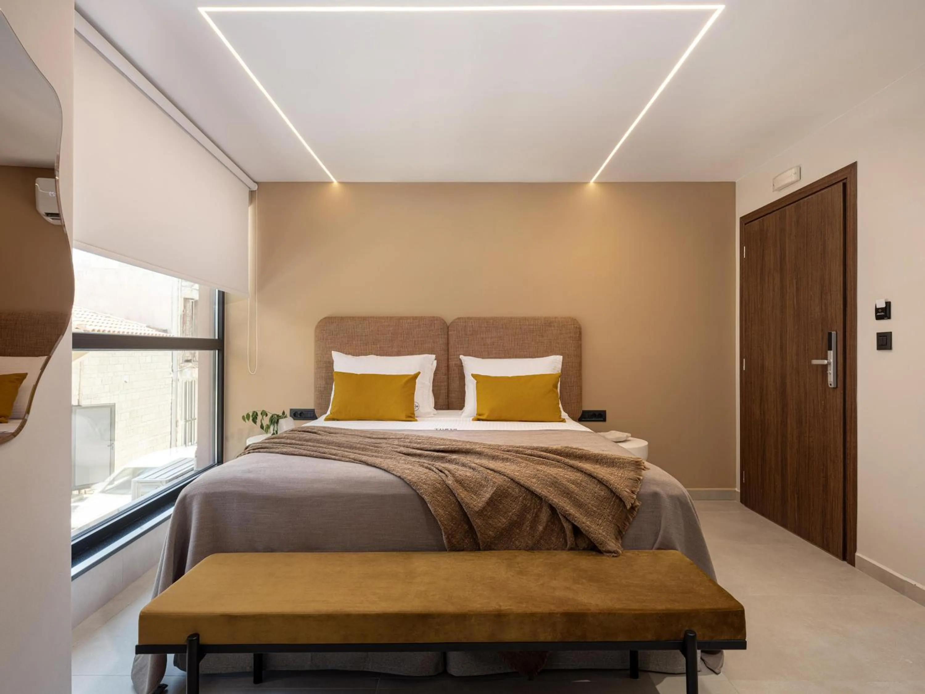 Bed in Theta Boutique Hotel